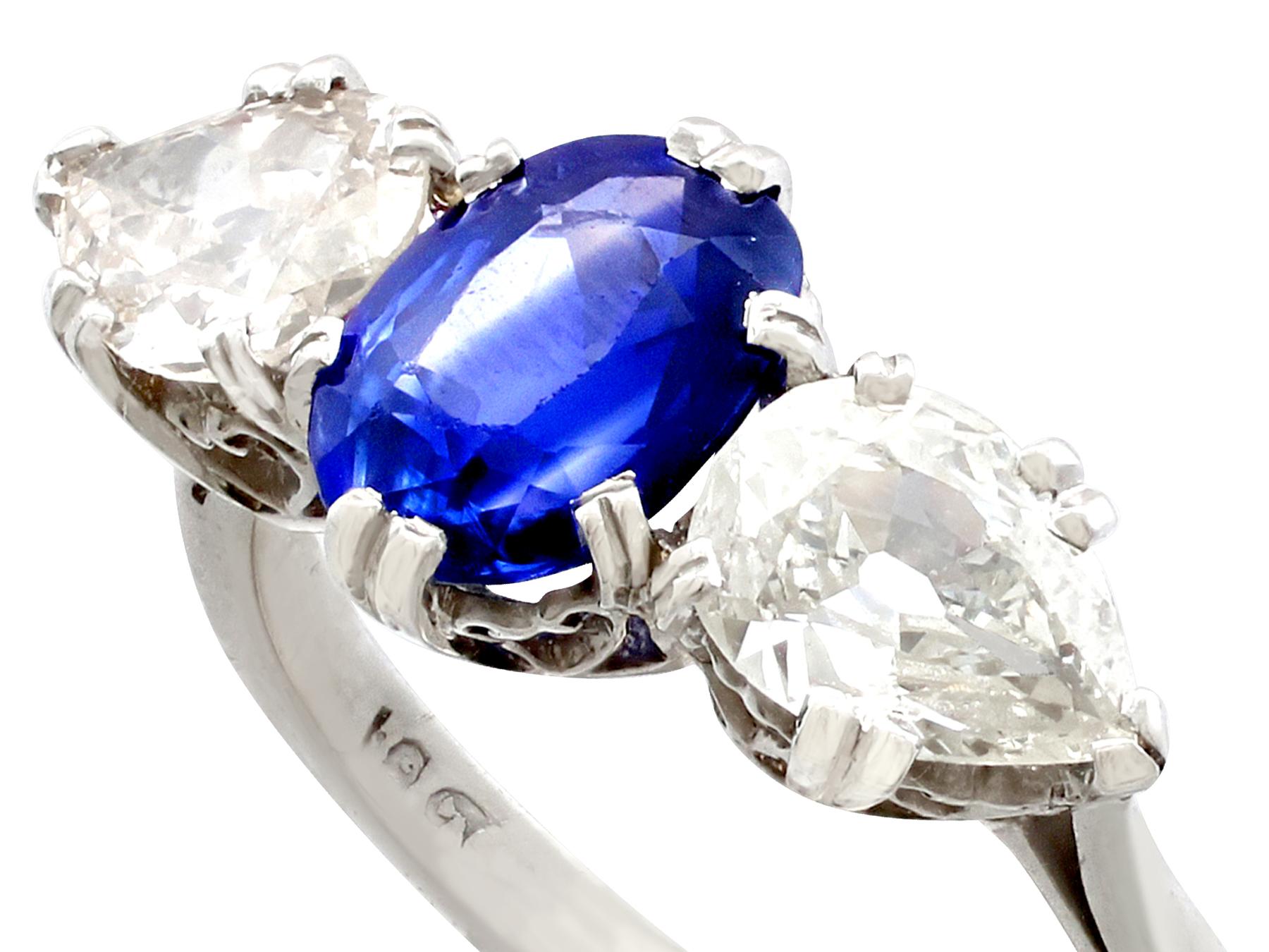 A stunning 2.30 carat Ceylon sapphire and 1.38 carat diamond, 18 karat white gold trilogy ring; part of our diverse gemstone jewellery and estate jewelry collections.

This stunning, fine and impressive trilogy engagement ring has been crafted in