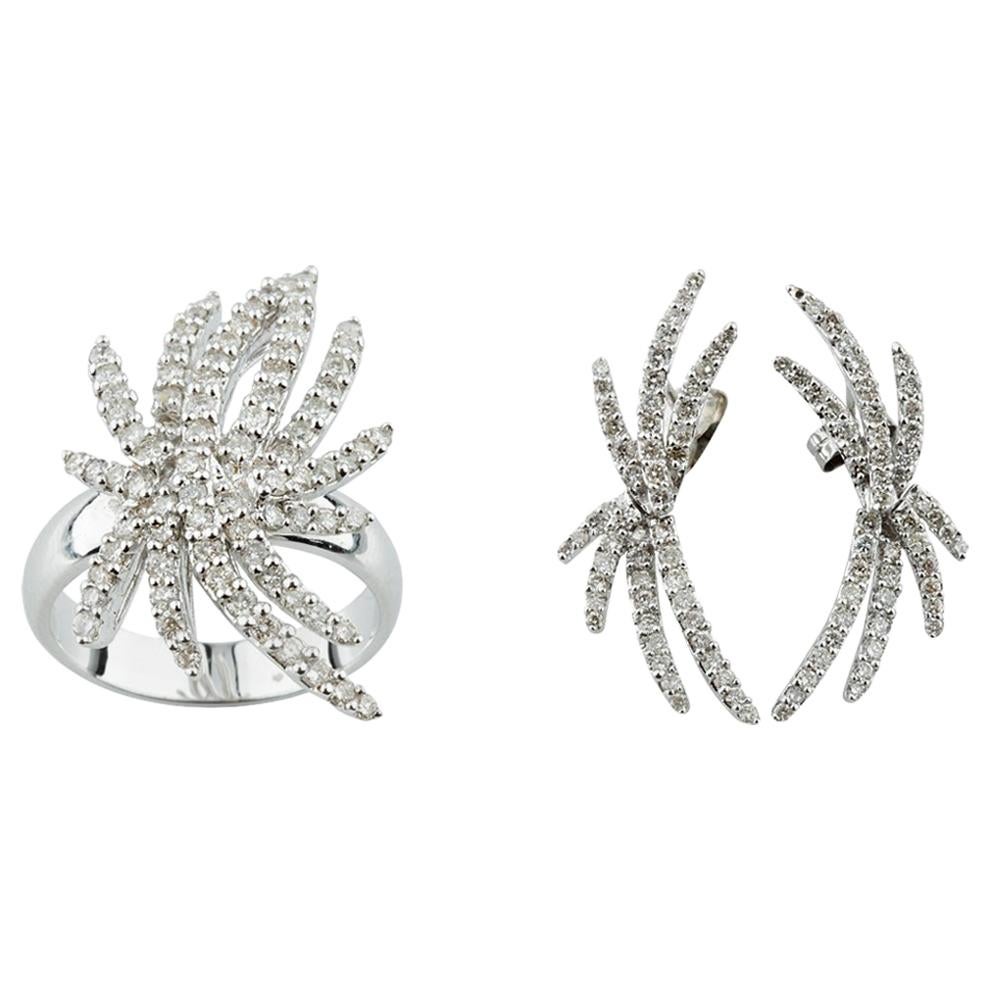 Bague cheminée et clous d'oreilles en or blanc sertis d'un diamant de 2,30 carats en vente