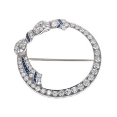 2.30 Carat Diamond Sapphire 14 Karat White Gold Bow Open Circle Art Deco Brooch