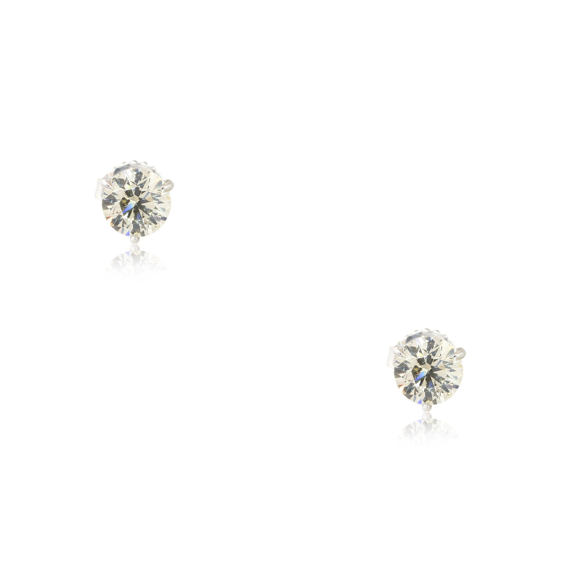 Material: 14k White Gold
Diamond Details: Approx. 2.30ctw of round cut Diamonds. Diamonds are J/K in color and SI1 in clarity
Total Weight: Unknown
Earring Backs: Friction Backs
Additional Details: This item comes with a presentation box!
SKU: