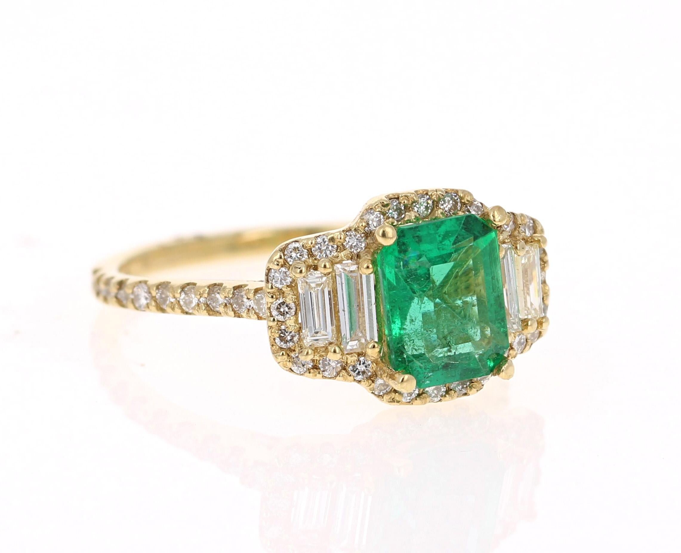A beauty that is sure to be nothing less than a statement! 

This ring has a magnificently beautiful Emerald-Square Cut Green Emerald that weighs 1.38 Carats and has 4 Baguette Cut Diamonds weighing 0.30 Carats. It is further embellished with 88