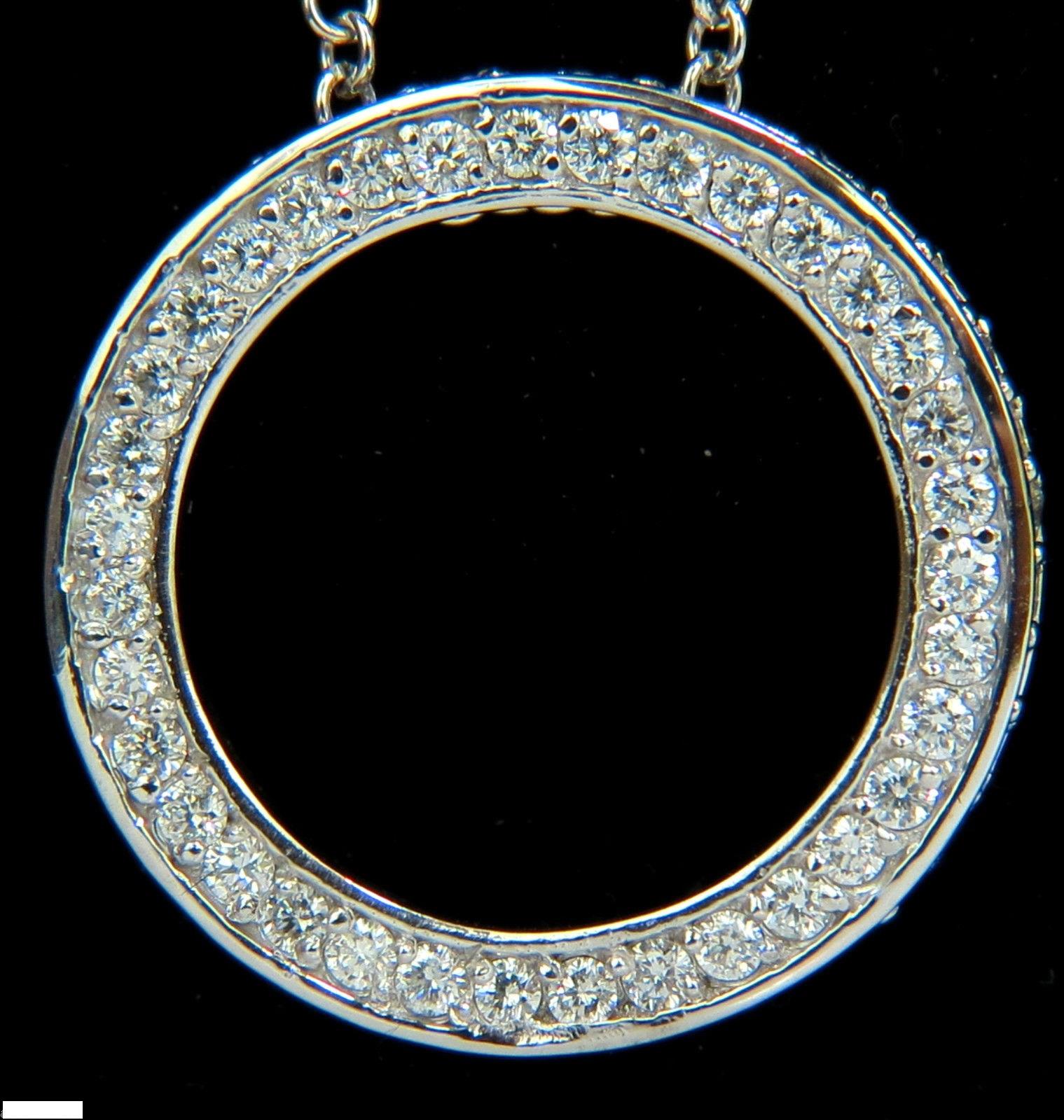 2.30ct. Diamonds 

Inside / Out circle

Full cuts, G-color, Vs-2 clarity

Diamonds are mounted within top of frame and profile.

.96 inch / 24.8mm diameter

3.8mm depth.

18 inch necklace included.

14kt. white gold

9 Grams

$6500 Appraisal will