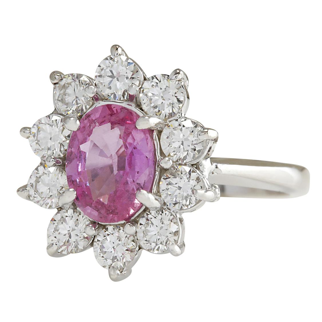 Elevate your style with our exquisite 2.30 Carat Natural Pink Sapphire Ring, set in luxurious 14K White Gold. The centerpiece of this captivating ring is a radiant pink Sapphire, weighing 1.29 Carats and measuring 8.00x6.00 mm. Adorning the sides