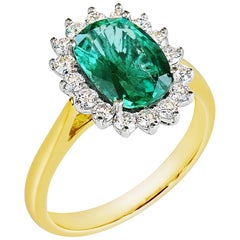 2.30 Carat Natural Oval Emerald Cluster Ring With 16 VS/G Diamonds in Solid 18K