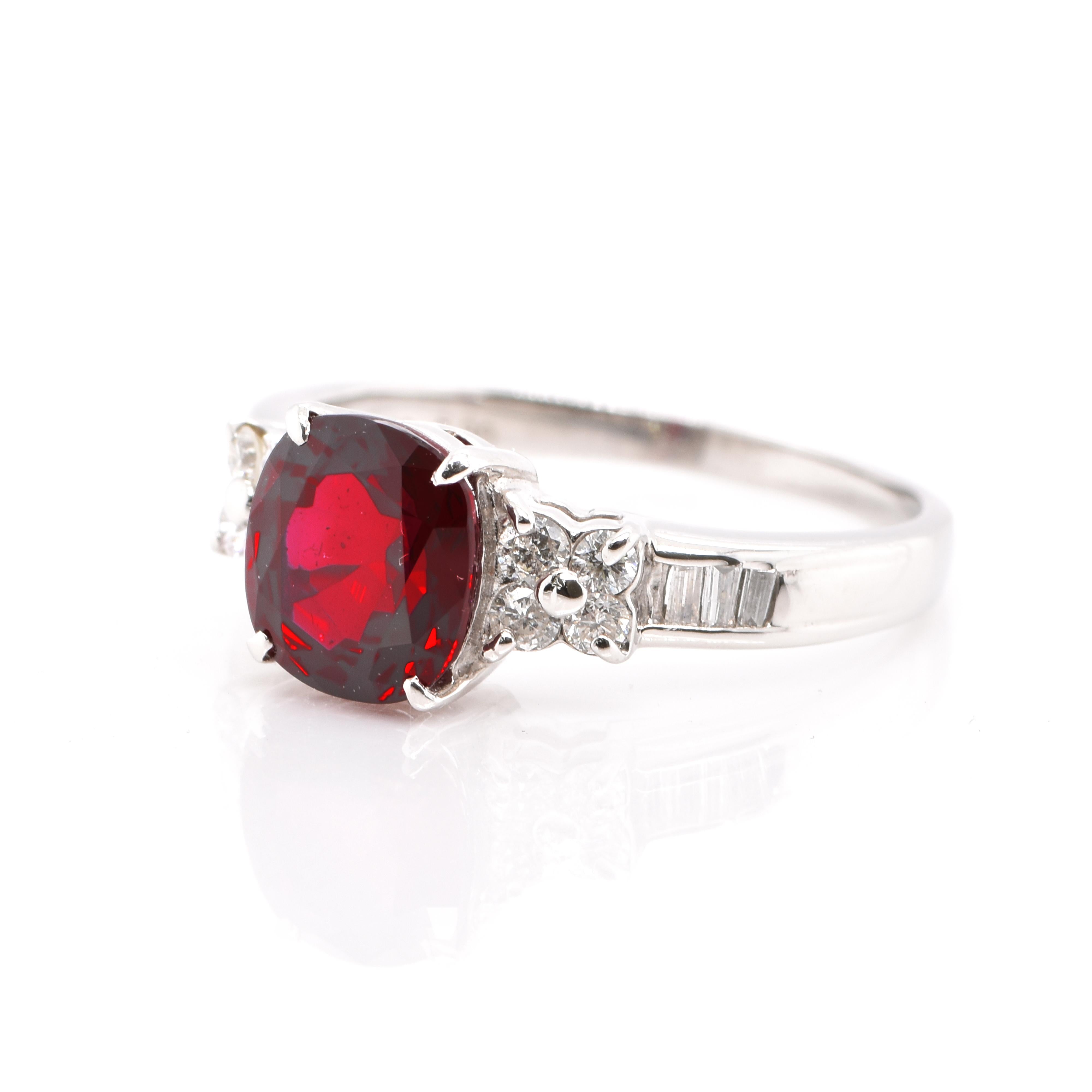 A stunning Ring featuring a GRS Lab Certified, 2.30 Carat, Natural, Vivid-Red Ruby and 0.31 Carats of Diamonds set in Platinum. Rubies are referred to as 
