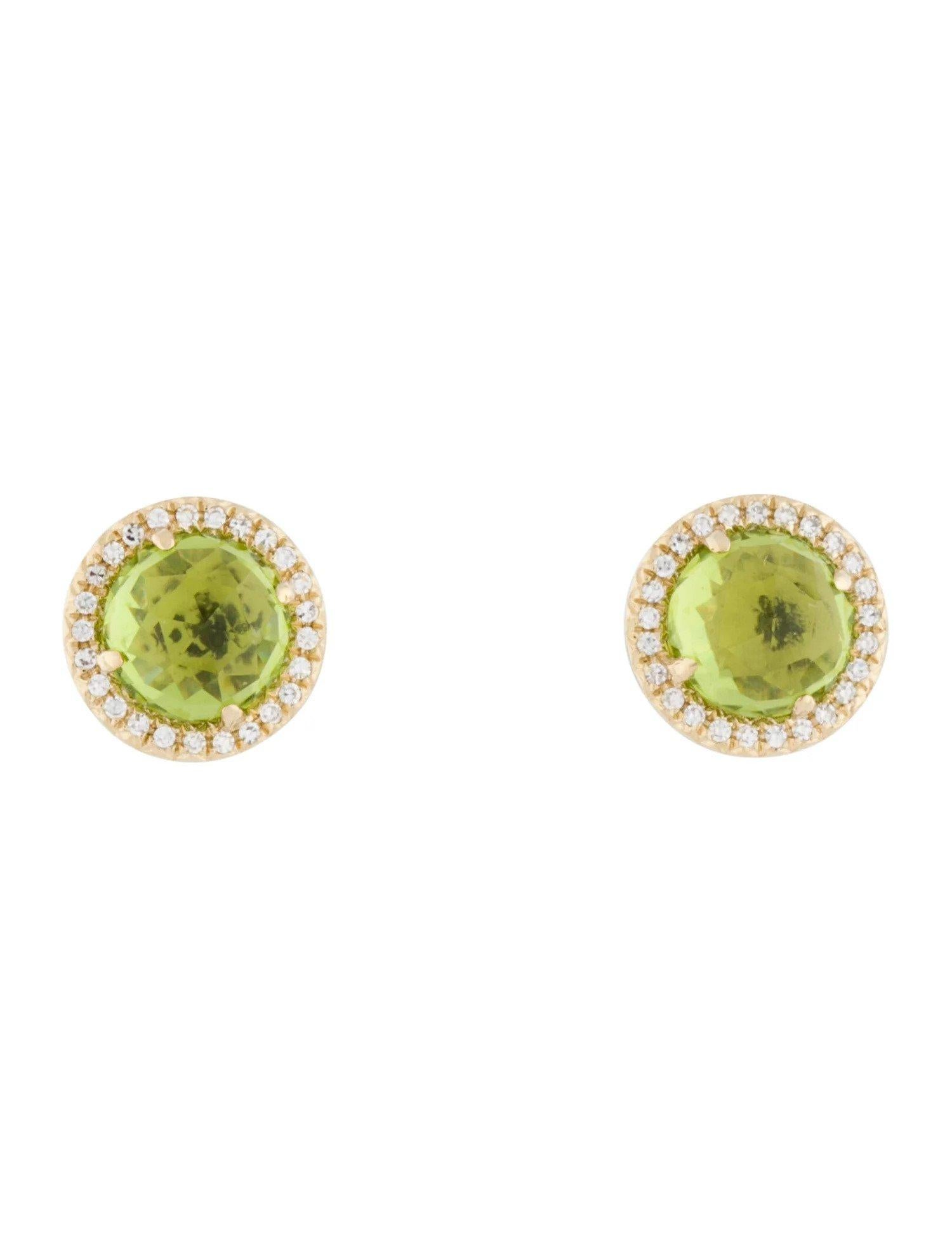 These Peridot  & Diamond Earrings are a stunning and timeless accessory that can add a touch of glamour and sophistication to any outfit. 

These earrings each feature a 1.15 Carat Round Peridot , with a Diamond Halo comprised of 0.06 Carats of