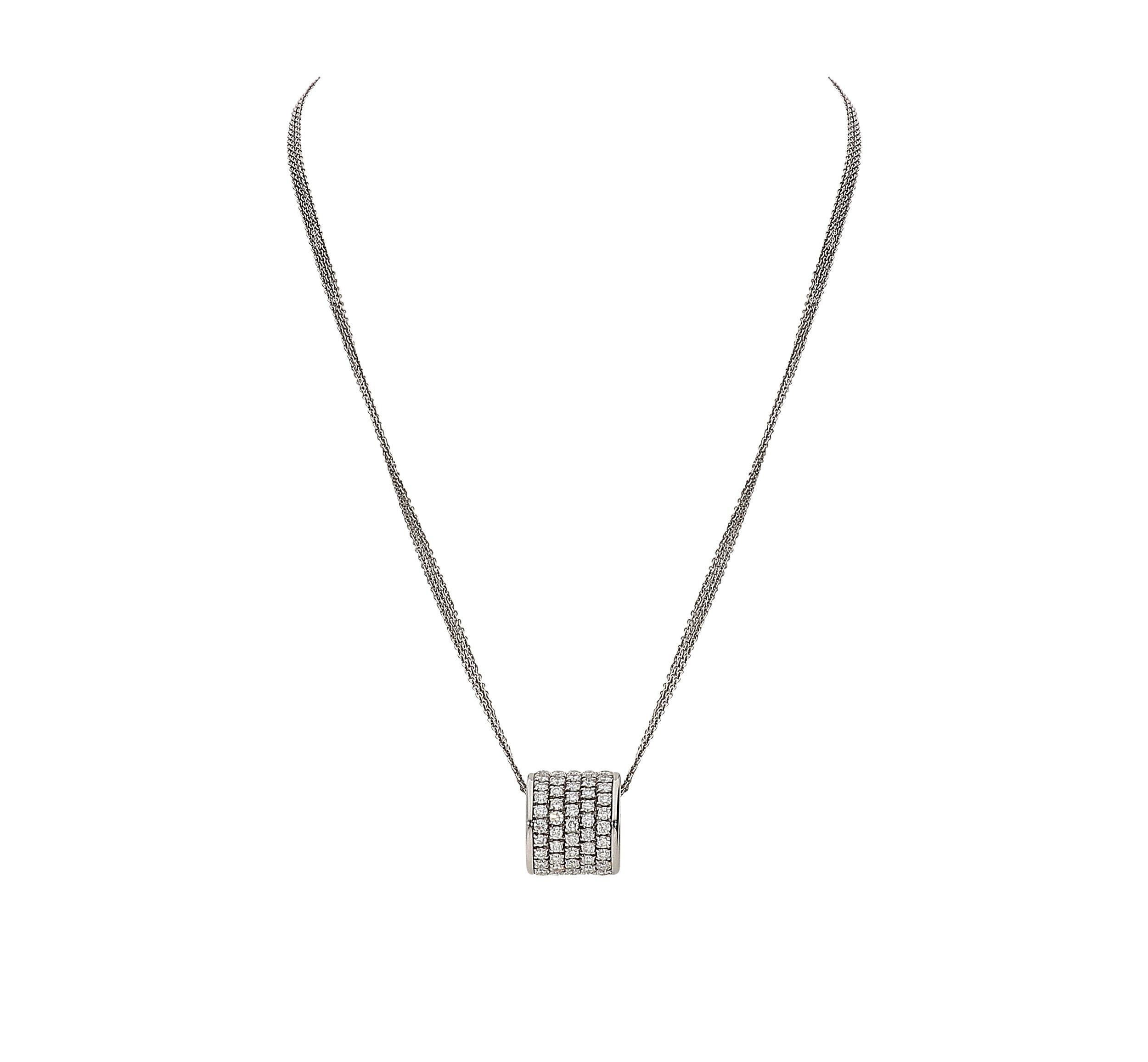 Shining round pendant with a 3 rows 42 centimeters chain in 18kt white gold for a total weight of 11,40 grams.
Diamonds are full set on 5 rows, color G clarity SI and 2,30 carats of weight.
The width of the pendant is 1,25 centimeters and the