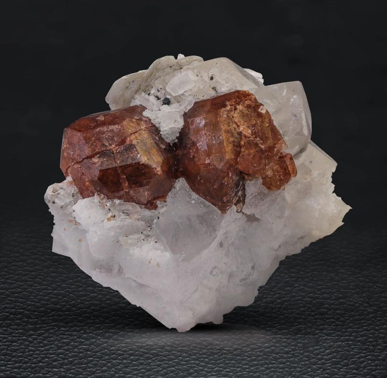 Product Information:

Specimen: Hassonite Garnet Crystals on Quartz with Schorl

Weight: 230 grams

Dimensions: H: 9.5 x W: 7 x D: 6 cm

Origin: Raikot Village, Chilas City, Diamer District, Gilgit Baltistan Province, Pakistan 

Treatment: