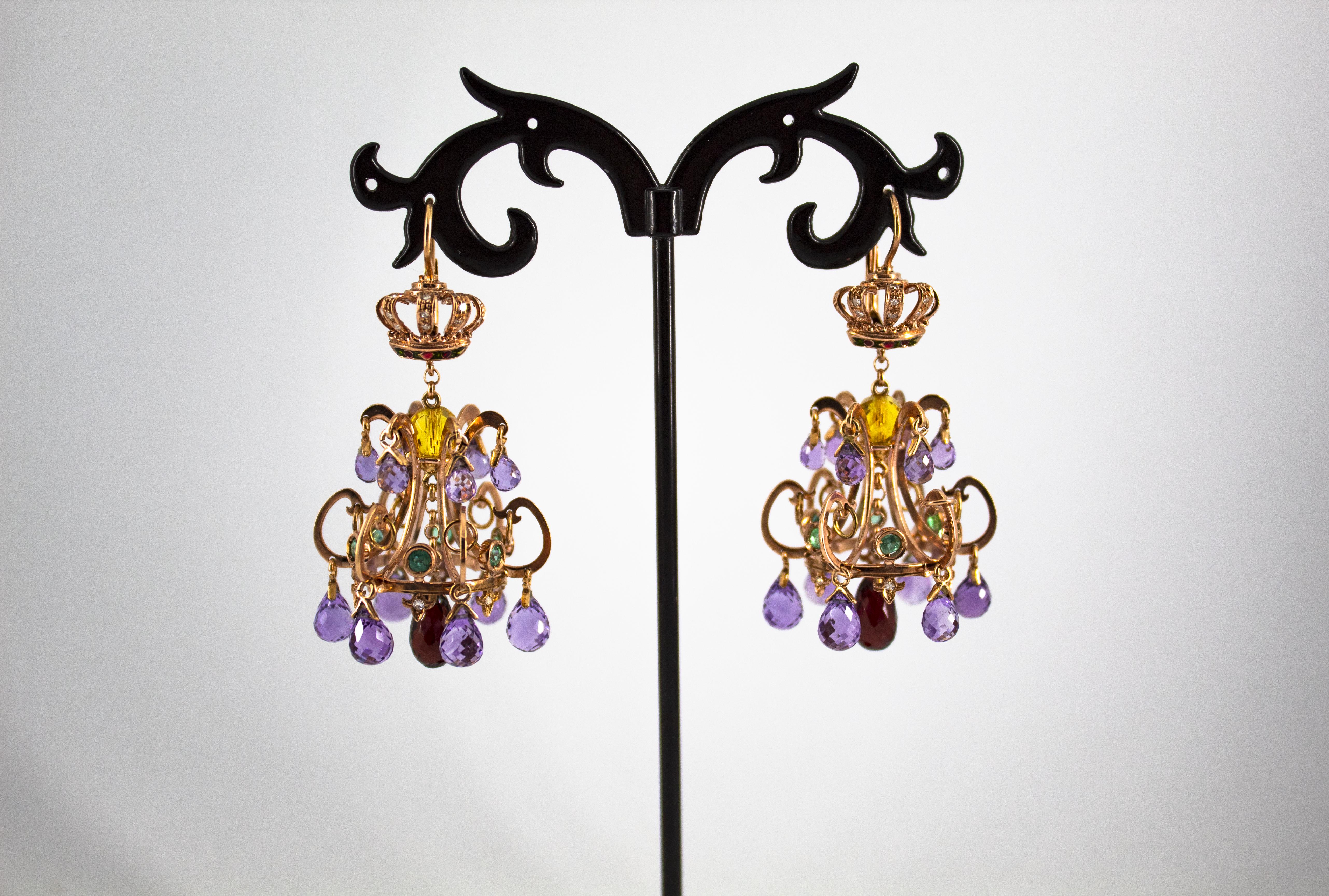 These Lever-Back Earrings are made of 14K Yellow Gold.
These Earrings have 0.25 Carats of White Diamonds.
These Earrings have 0.84 Carats of Emeralds.
These Earrings have 18.00 Carats of Amethysts.
These Earrings have 2.00 Carats of Citrine.
These