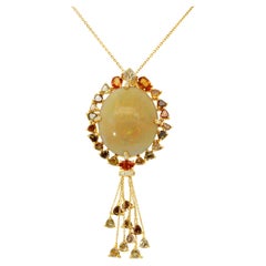 23.09ct Opal, Diamond and Sapphire set Pendant