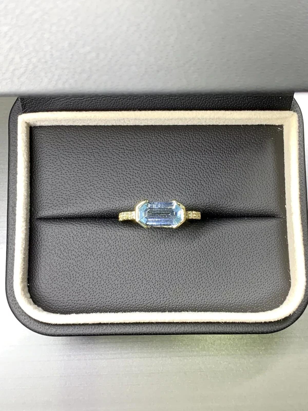 2.30ct Aquamarine and Diamonds engagement ring in 18k yellow gold.

Beautiful handcrafted aquamarine double bullet shape set in 18ct yellow gold, diamond band.

The ring can be resized

Hallmarked

Box and valuation included.