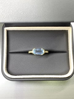 2.30ct Aquamarine and Diamonds engagement ring in 18k yellow gold.