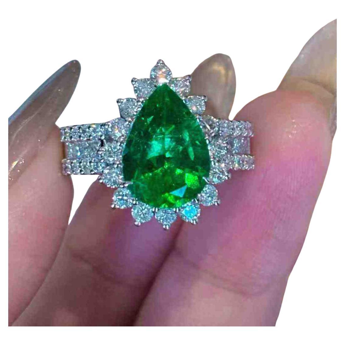 2.30ct Emerald Pear 
1.22ct Diamond Halo Ring in Platinum PT 950 For Sale