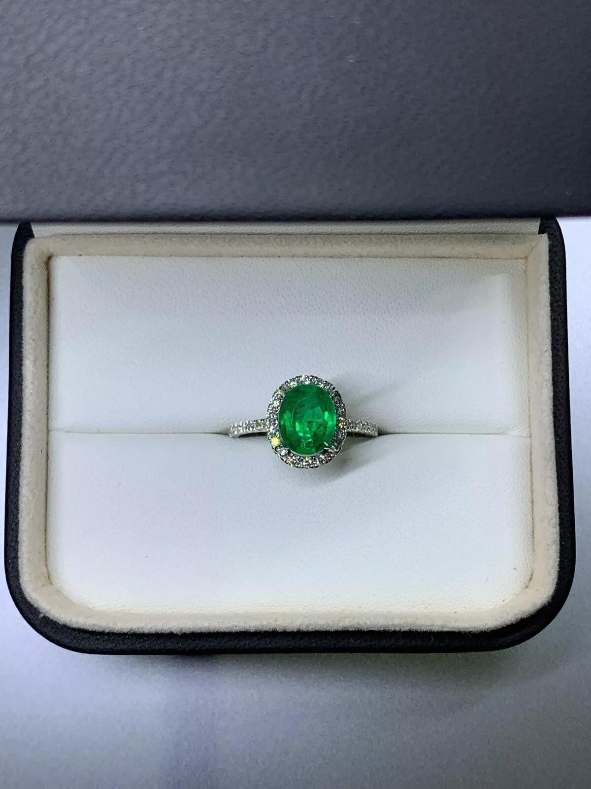 2.30ct Green emerald Colombian diamond halo engagement ring 18ct white gold.

Gorgeous Colombian green emeralds oval shaped with diamond halo in 18ct white gold engagement ring.

Chunky large Colombian emerald gemstone set with diamonds solitaire