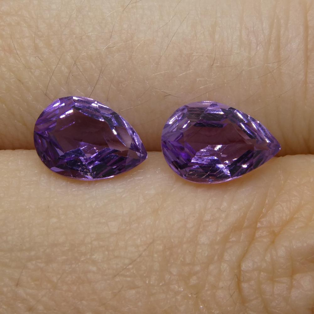 Description:

Gem Type: Amethyst
Number of Stones: 2
Weight: 2.3 cts
Measurements: 9.00 x 6.00 x 4.20 mm
Shape: Pear
Cutting Style Crown: Modified Brilliant
Cutting Style Pavilion: Mixed Cut
Transparency: Transparent
Clarity: Very Slightly Included: