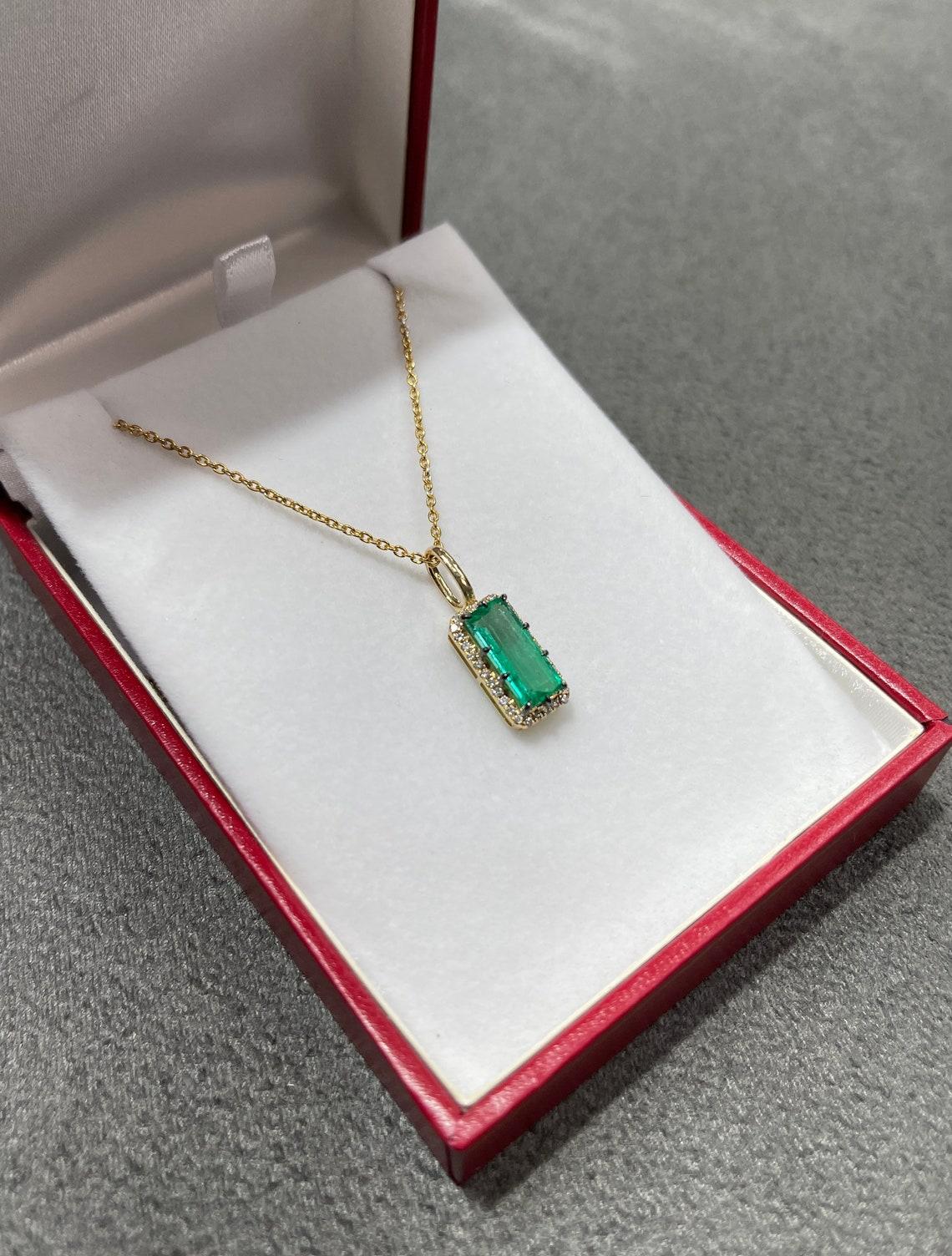 emerald cut emerald pendant