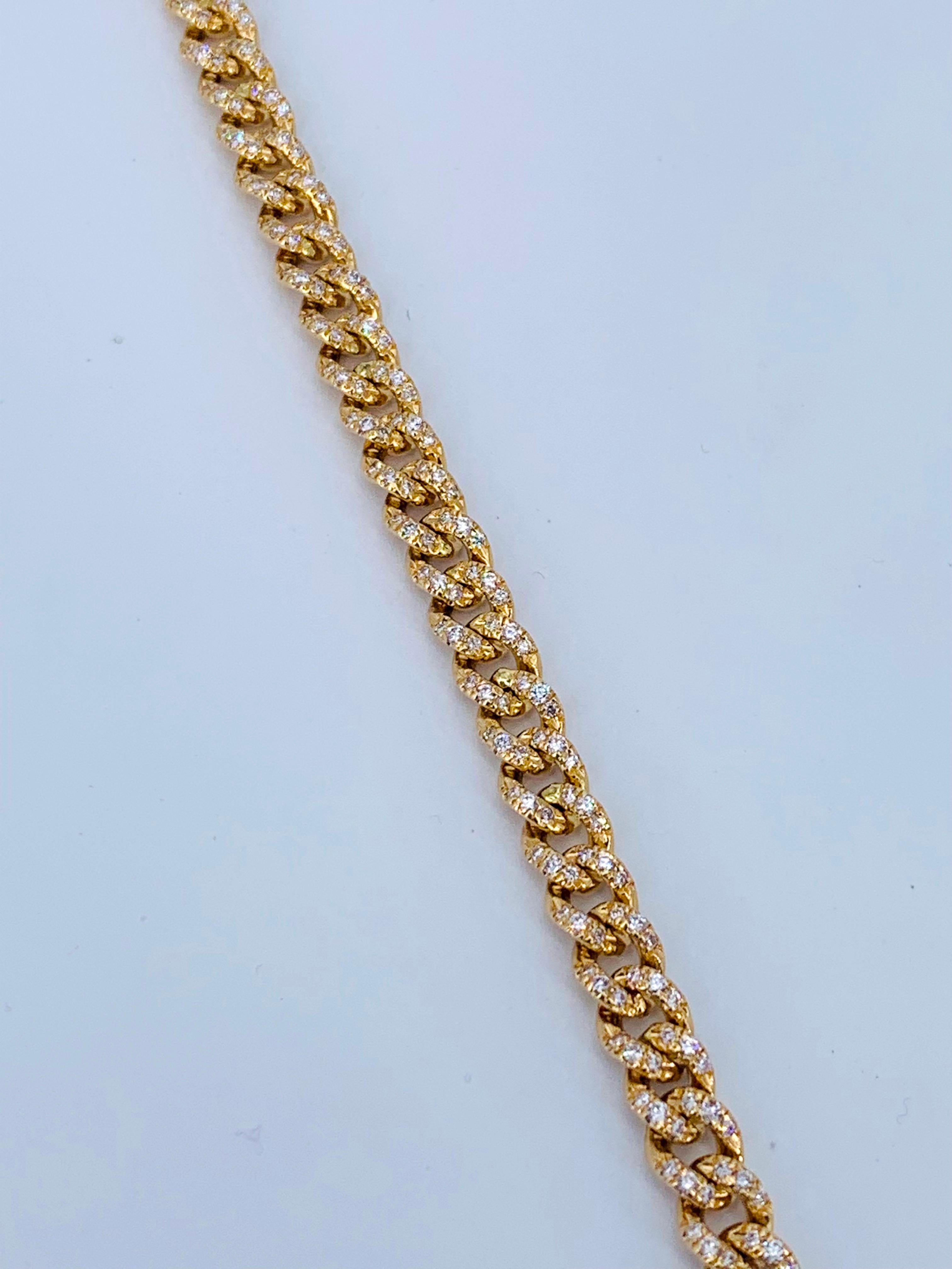 This fabulous Certified Yellow Gold 2.31 Carat Diamond Groumette Tennis Bracelet is unisex and fabulous on any wrist. 

Fully paved with 2.31 carats of diamonds, meaning one side of the linked chains is fully covered with diamonds & the other side