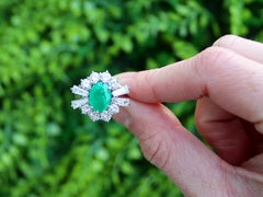 2.31 Carat Emerald and 2.12 Carat Diamond 18k White Gold Cluster Ring Circa 1970