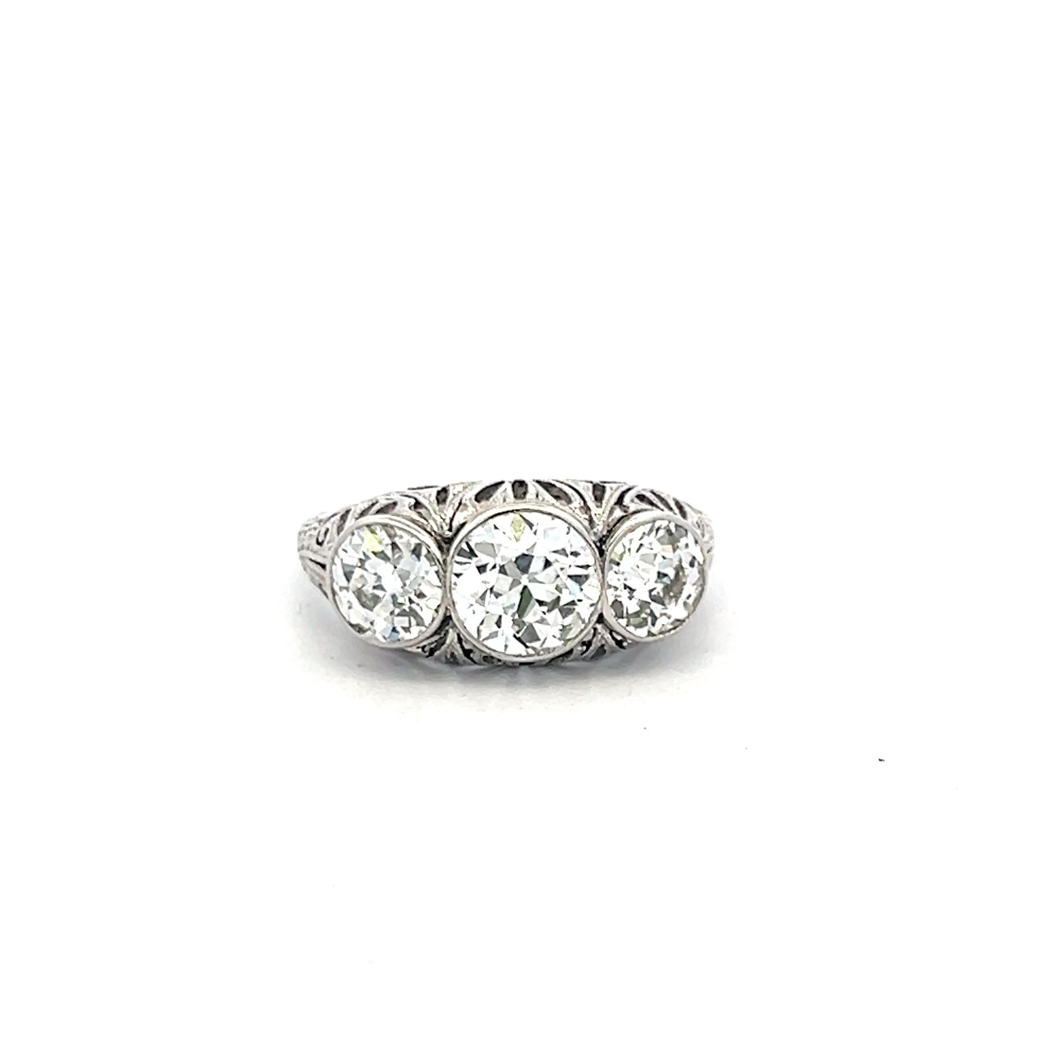 2.31 Carat Old European Cut I VS2 Diamond Platinum Three-Stone Ring For Sale 1