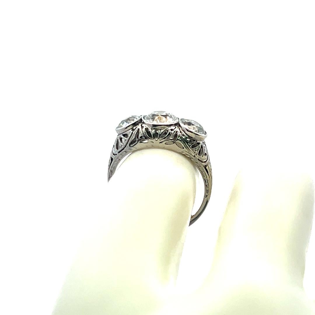 2.31 Carat Old European Cut I VS2 Diamond Platinum Three-Stone Ring For Sale 4