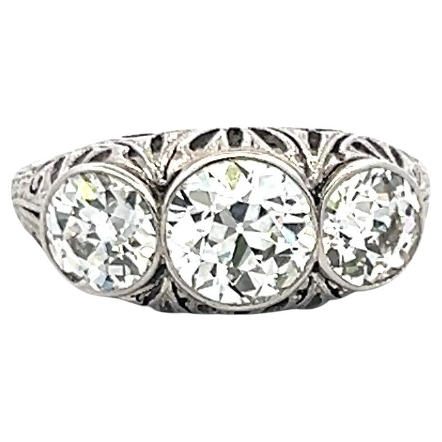 2.31 Carat Old European Cut I VS2 Diamond Platinum Three-Stone Ring For Sale