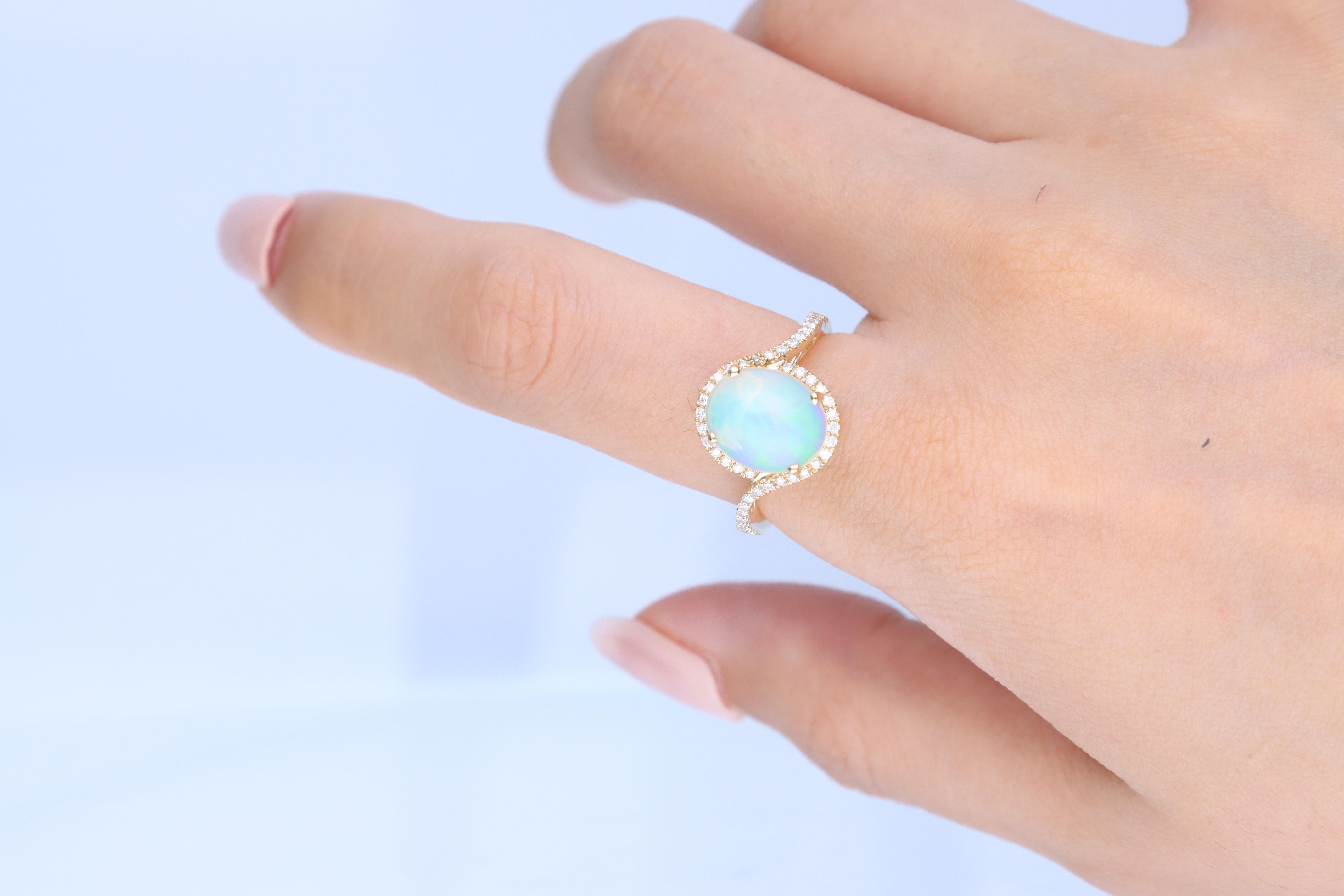 2.31 Carat Oval-Cab Ethiopian Opal Diamond Accents 14K Yellow Gold Ring In New Condition For Sale In New York, NY