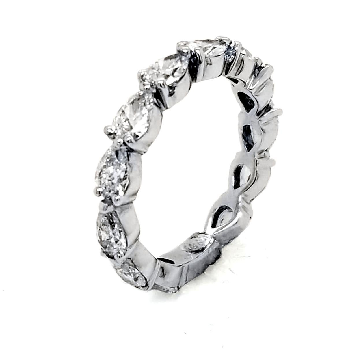 This beautiful Eternity Ring is made in 18K Gold with 12 perfectly matched Pear Brilliant Diamonds Set in Shared Prong Mode with a sizing bar.
Total Weight of diamonds: 2.31 Ct  VS-SI1/G-H
Total Weight of the Ring: 3.70 Gr 18K White Gold
Ring Size: