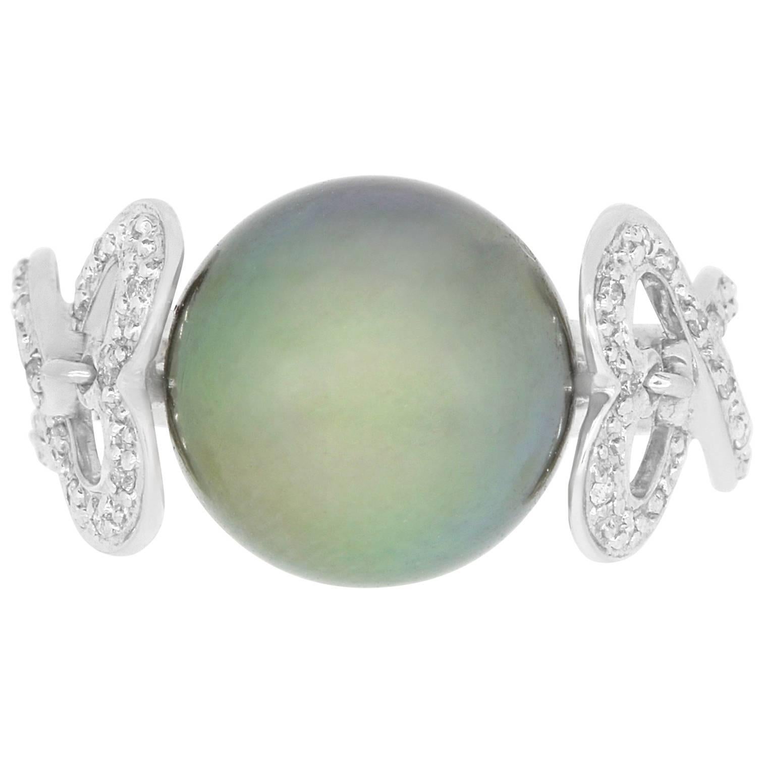 Material: 18k White Gold 
Center Stone Details: 2.31 Carat Tahitian South Sea Pearl 
Mounting Diamond Details: Brilliant Round White Diamonds Approximately 0.13 Carats - Clarity: VS-SI / Color: H-I
Ring Size: Size 6.5. Alberto offers complimentary