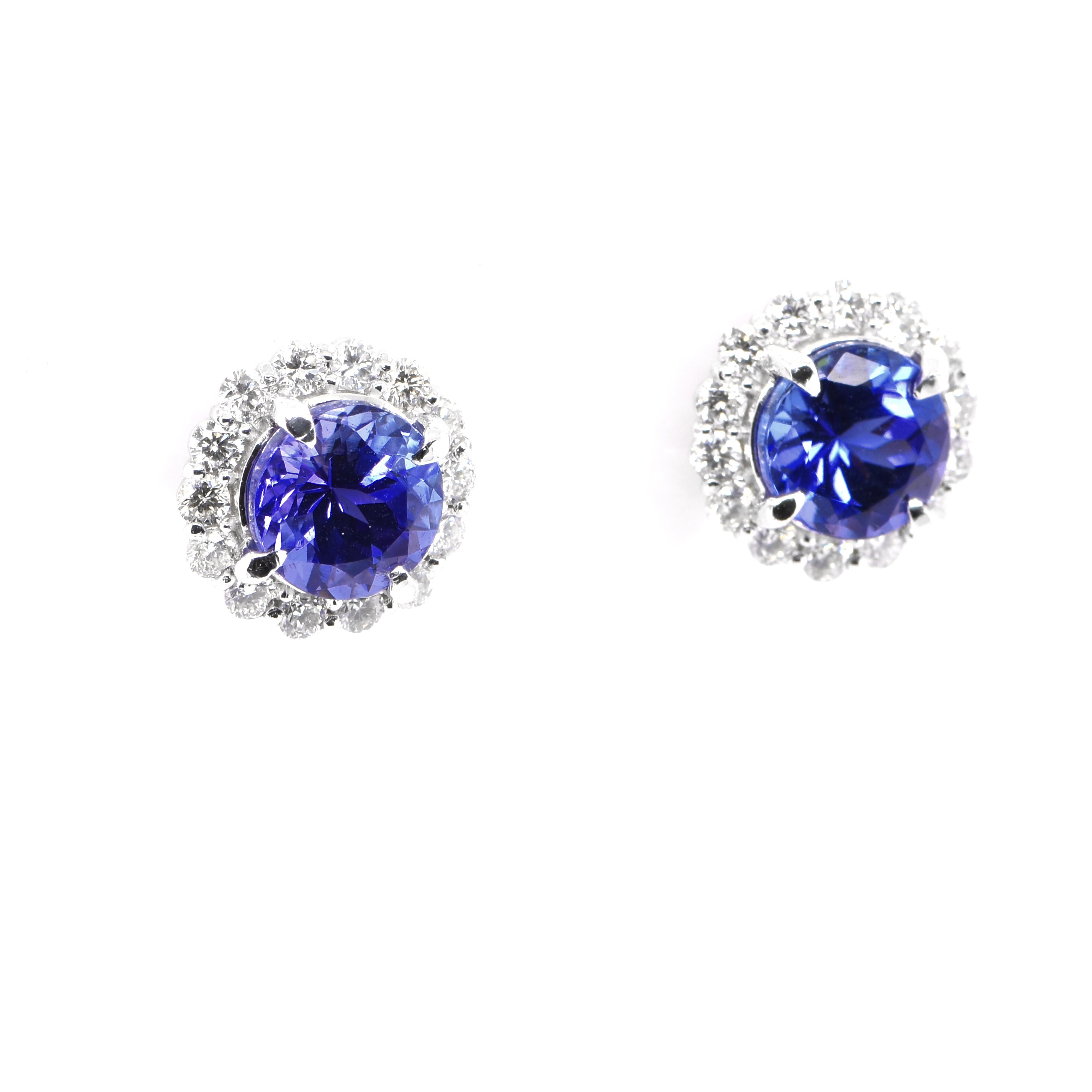 A beautiful pair of earrings featuring a total 2.31 Carats Natural Tanzanites and 0.50 Carats of Diamond Accents set in Platinum. Tanzanite's name was given by Tiffany and Co after its only known source: Tanzania. Tanzanite displays beautiful