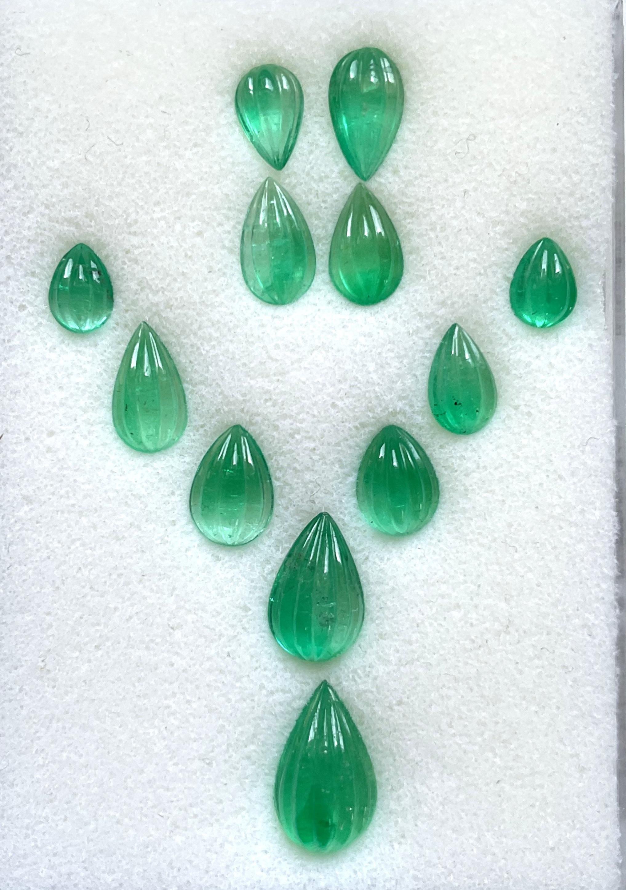23.14 Carats Colombian Top Emerald Carved Pear Cabochon Layout Natural Gemstone
Gemstone - Emerald
Weight - 23.14 carats
Shape - Carved Cabochon Pear
Size - 5.5 x 7.5 To 9x15 MM
Quantity - 12 Pieces