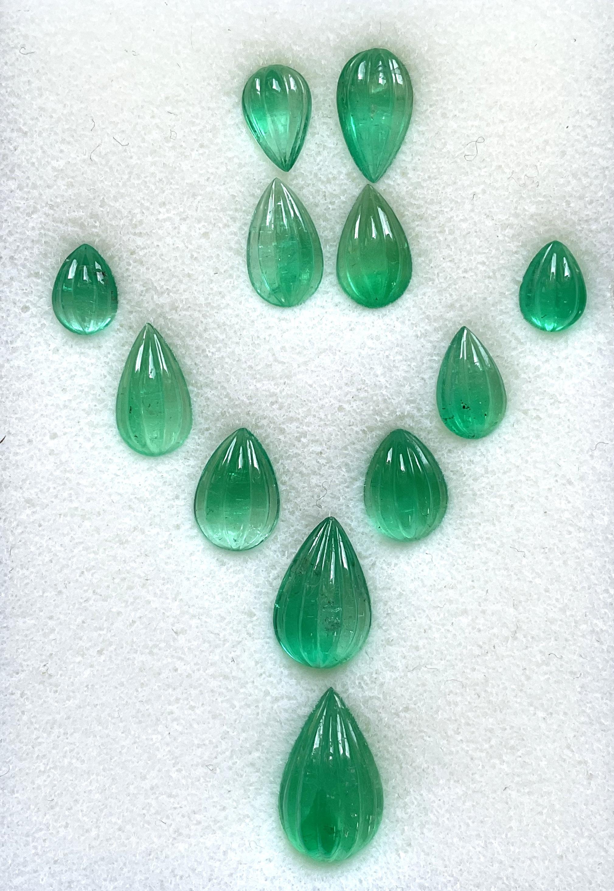 Art Deco 23.14 Carats Colombian Top Emerald Carved Pear Cabochon Layout Natural Gemstone For Sale