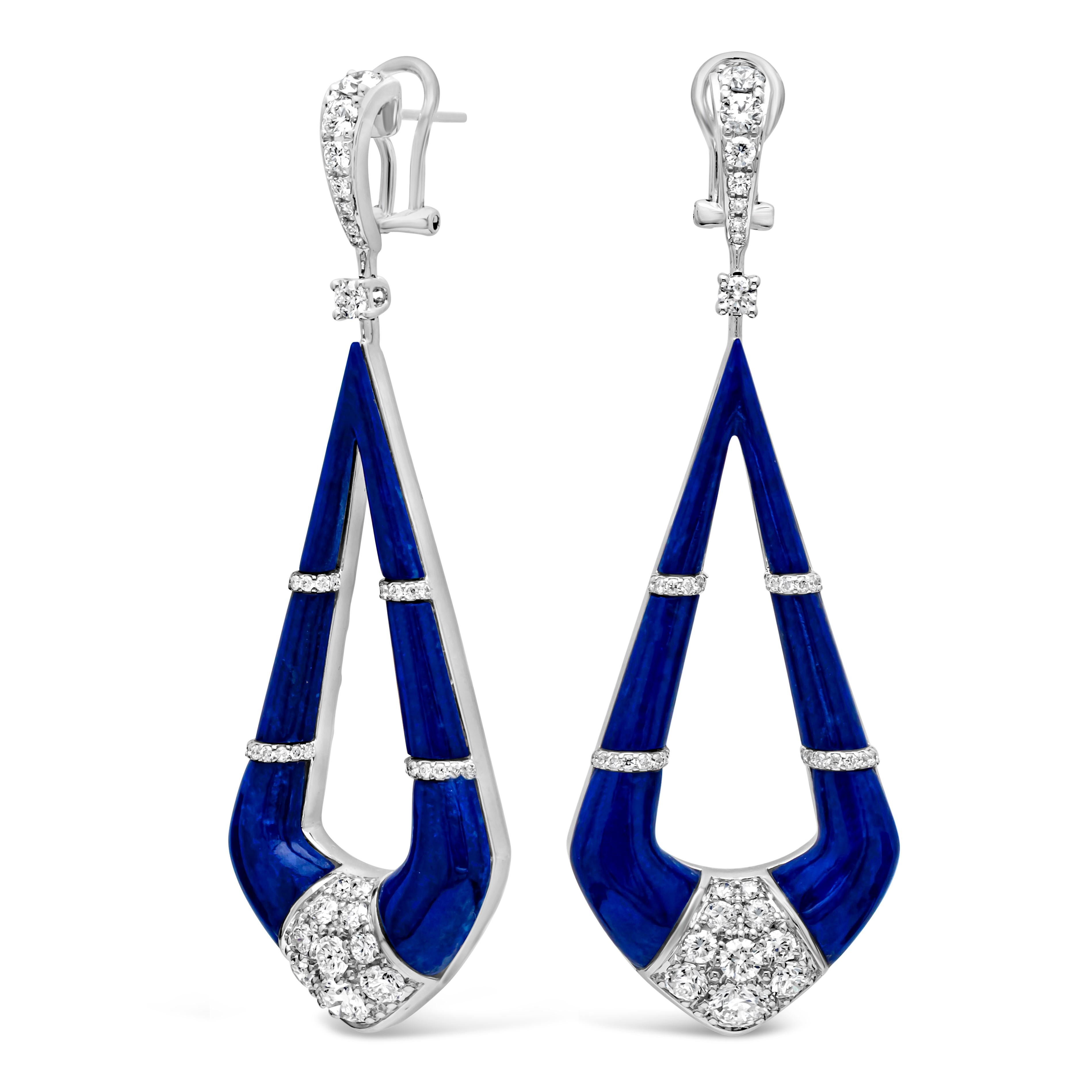 Showcasing a gorgeous and fashionable dangle pietra collection earrings set with beautiful Lapis Lazuli weighing 23.15 carats total, encrusted with brilliant round cut diamonds in a micro-pave setting. Suspended on a round melee diamond set in a