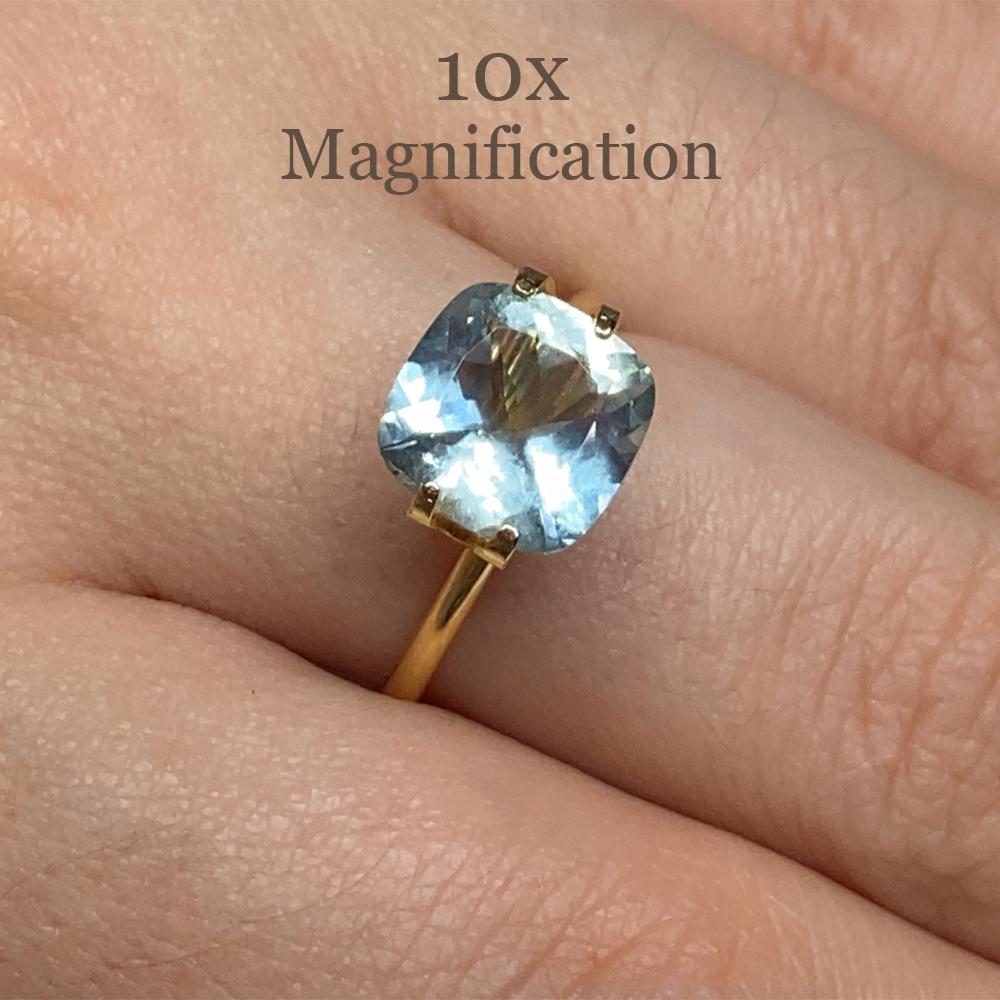 Description:

Gem Type: Aquamarine
Number of Stones: 1
Weight: 2.31 cts
Measurements: 9.11 x 9.10 x 4.96 mm
Shape: Cushion
Cutting Style Crown: Brilliant Cut
Cutting Style Pavilion: Mixed Cut
Transparency: Transparent
Clarity: Slightly Included: