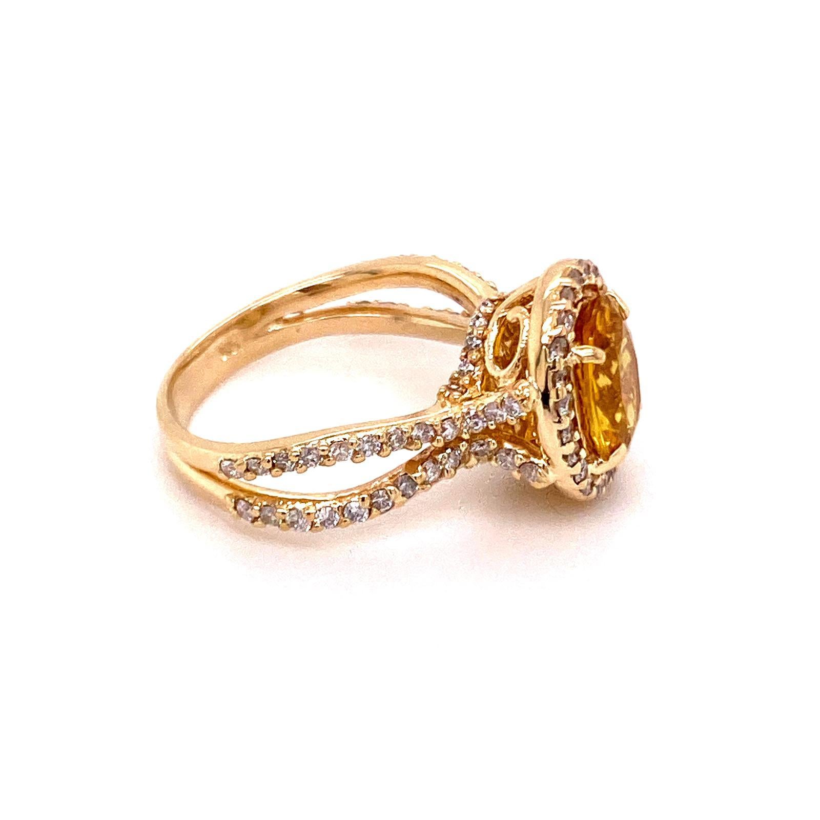 14K YELLOW GOLD YELLOW CEYLON SAPPHIRE RING:5.91 GRAMS/DIAMOND:1.12CT/YELLOW SAPPHIRE:2.31CT/#GVR1030 **Warmly crafted in 14kt yellow gold, this delicate style features a dazzling 2.31ct oval shape rare Yellow Sapphire center stone. Yellow Sapphire