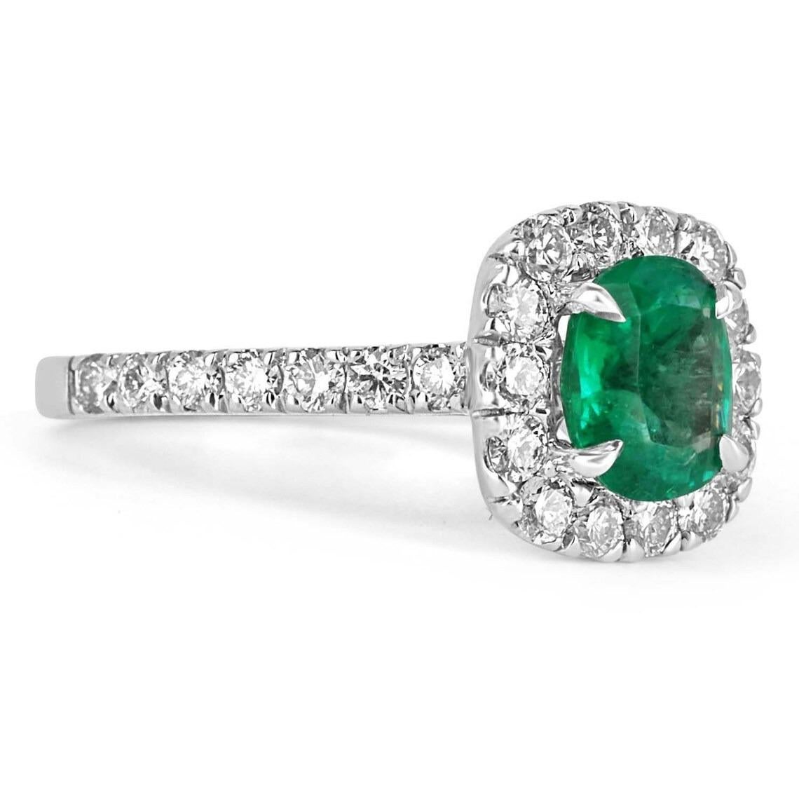 Metal Purity: 14K White Gold
Ring Setting: Halo
Gold Weight: 4.3 grams

Main Stone: Emerald
Shape: Cushion Cut
Weight: 1.33-carats
Clarity: Very Good
Color: Green
Luster: Very Good
Origin: Colombia
Treatments: Natural

Secondary Stone: