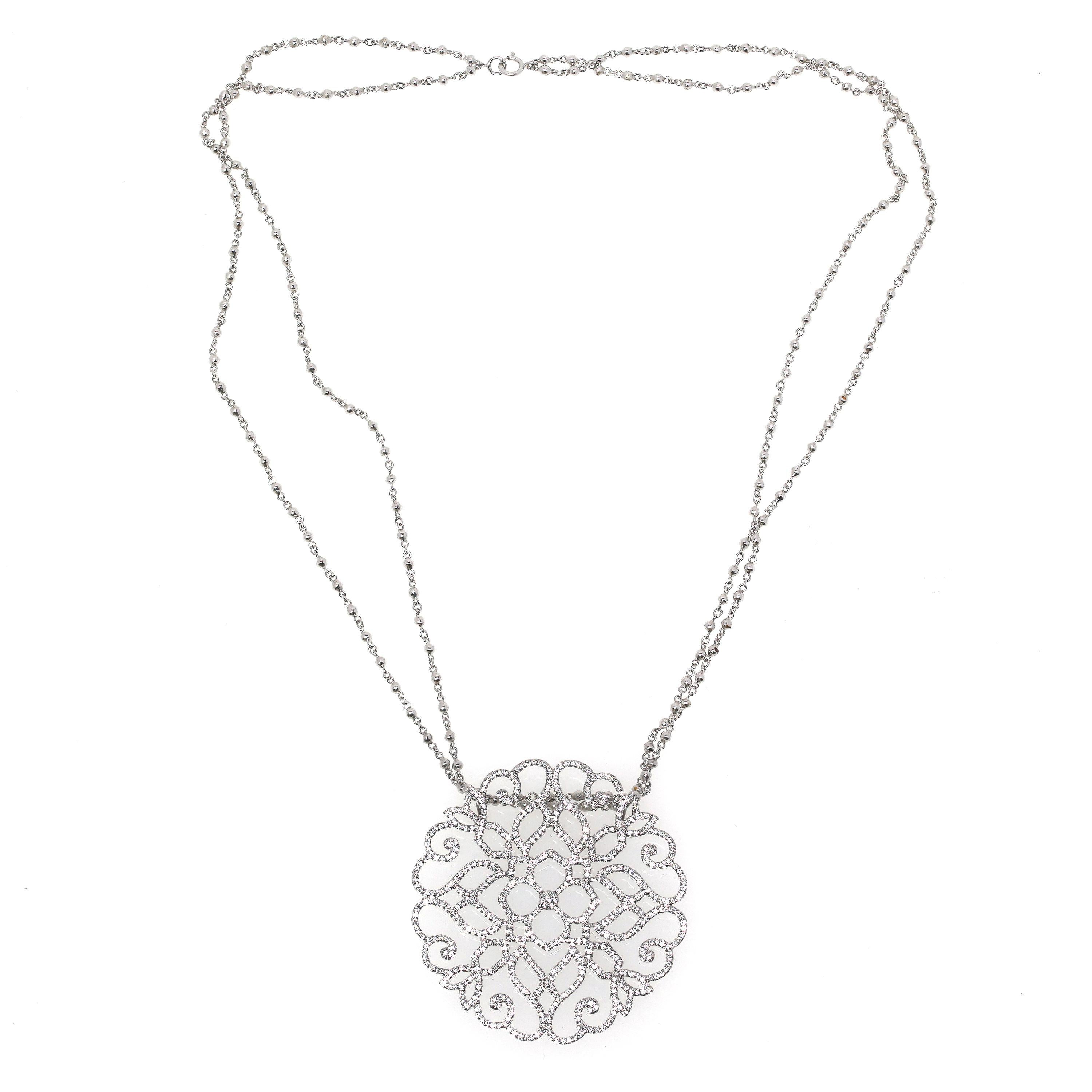This gorgeous set has a great Gothic floral look featuring a diamond-encrusted drop pendant hanging from an 18K White Gold chain necklace. The pendant is set with genuine/natural diamonds in a flower design in white gold.

-Diamond 2.32 carat 