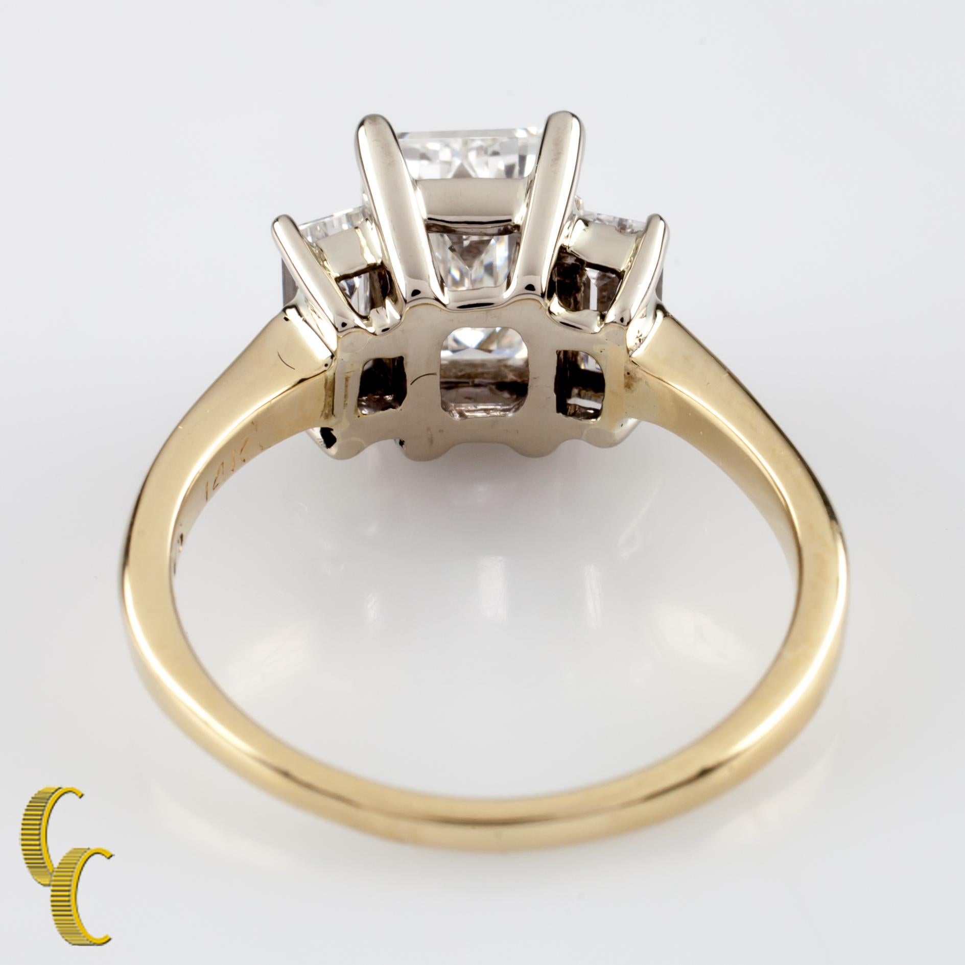 2.32 Carat Emerald Cut Diamond 14 Karat Yellow Gold Three-Stone Engagement Ring In Good Condition In Sherman Oaks, CA