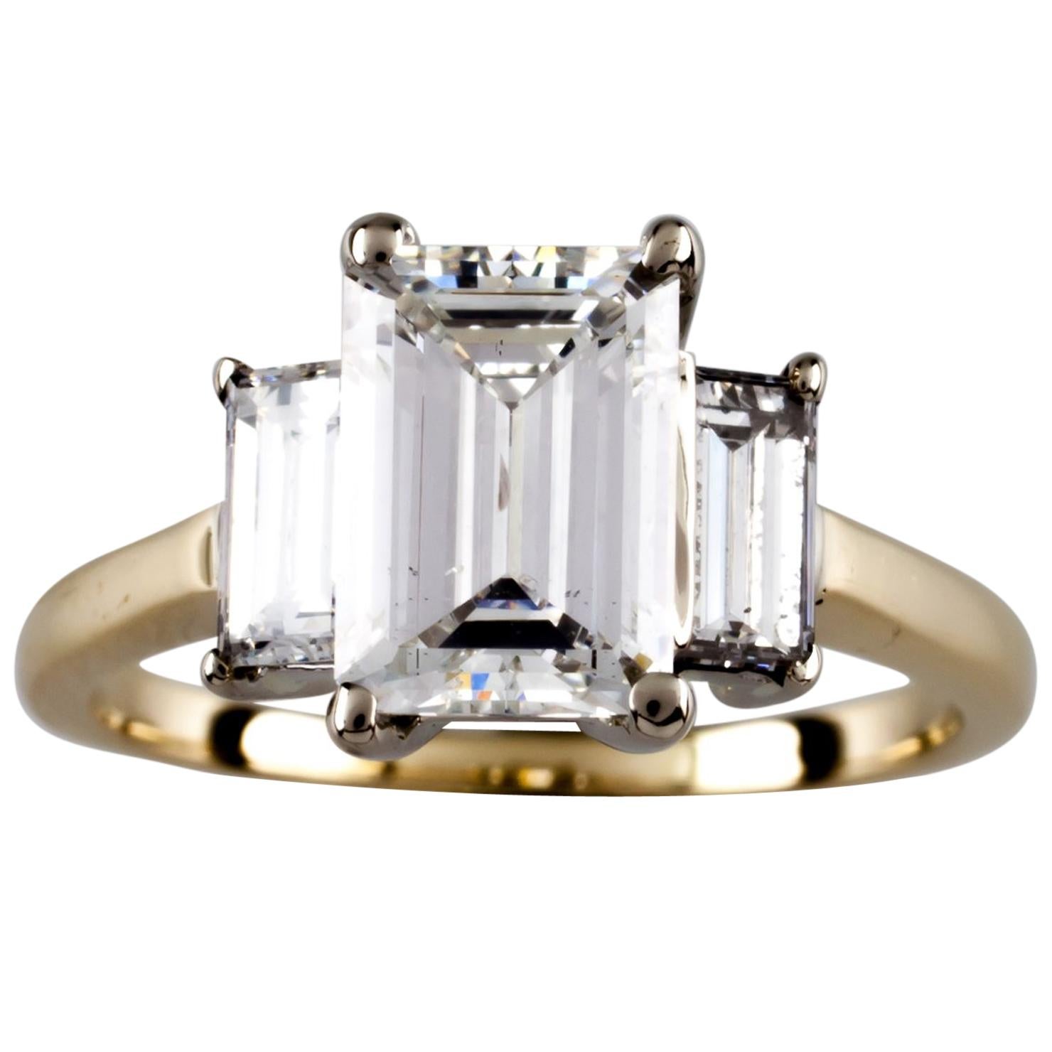 2.32 Carat Emerald Cut Diamond 14 Karat Yellow Gold Three-Stone Engagement Ring