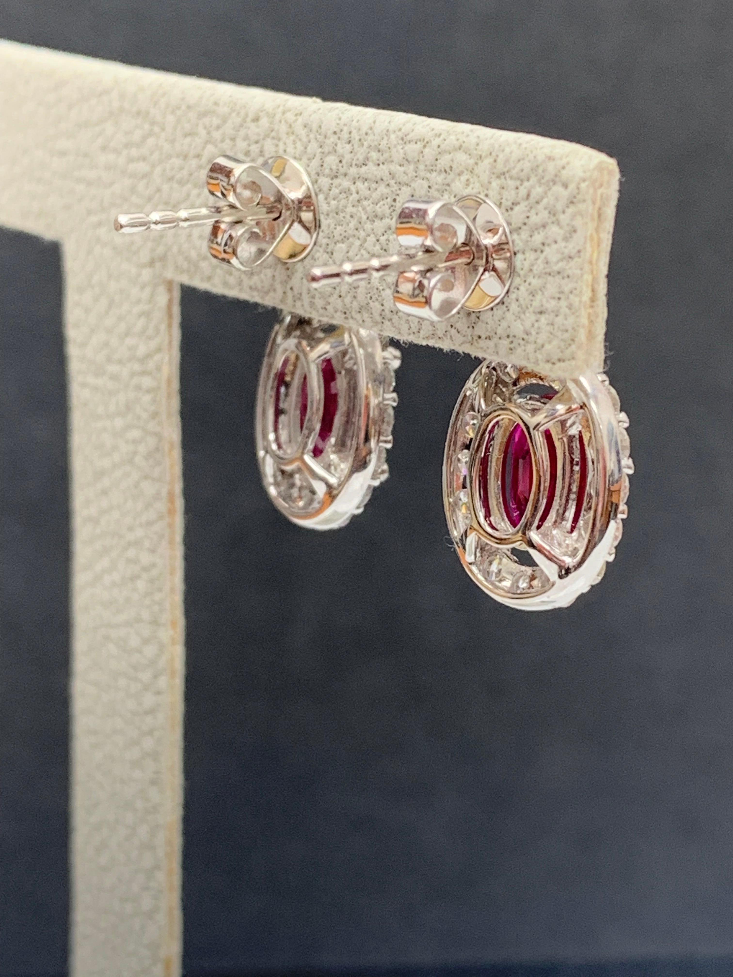 2.32 Carat of Oval cut Rubies and Diamond Drop Earrings in 18K White Gold In New Condition For Sale In NEW YORK, NY