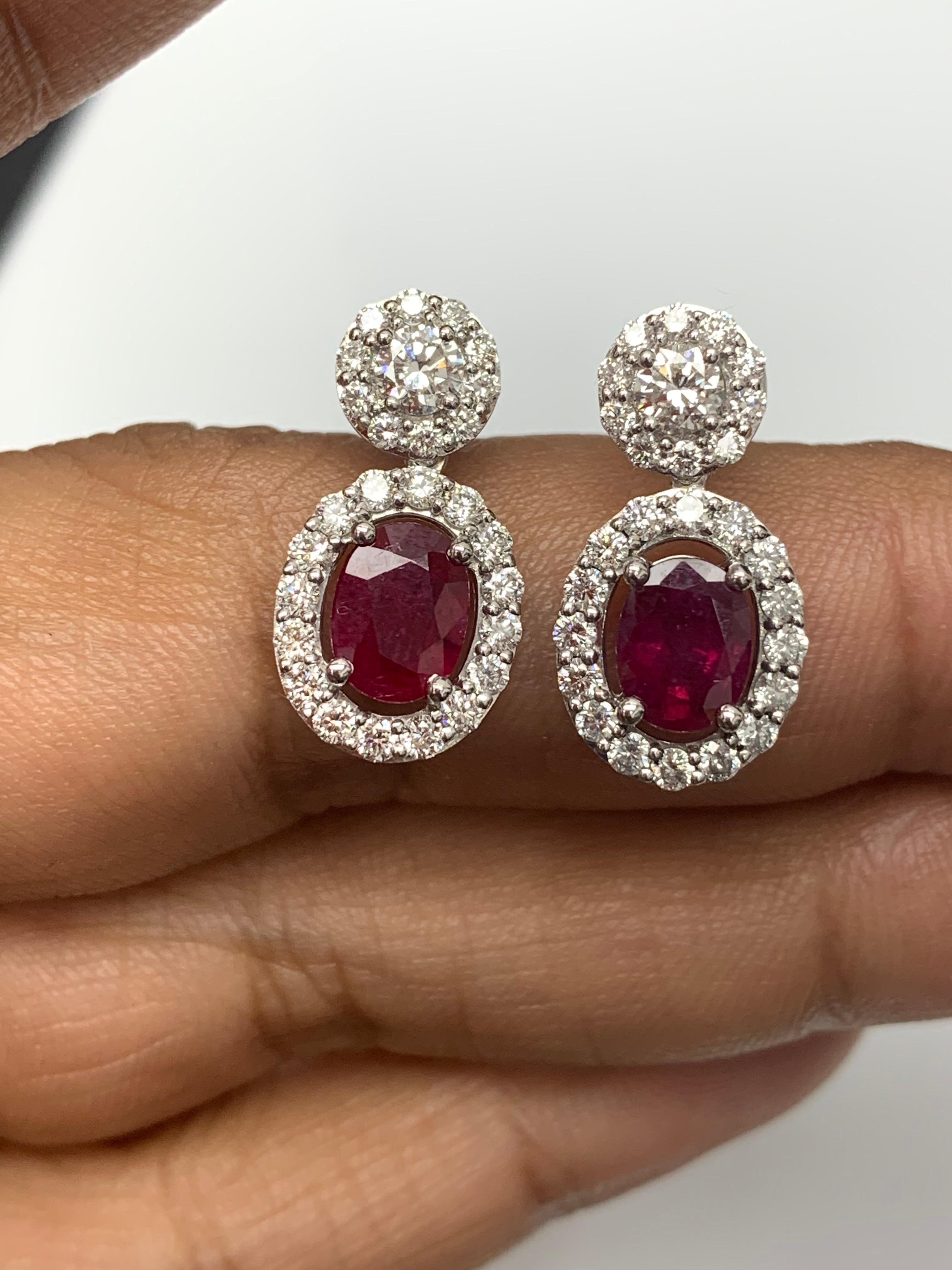 2.32 Carat of Oval cut Rubies and Diamond Drop Earrings in 18K White Gold For Sale 1