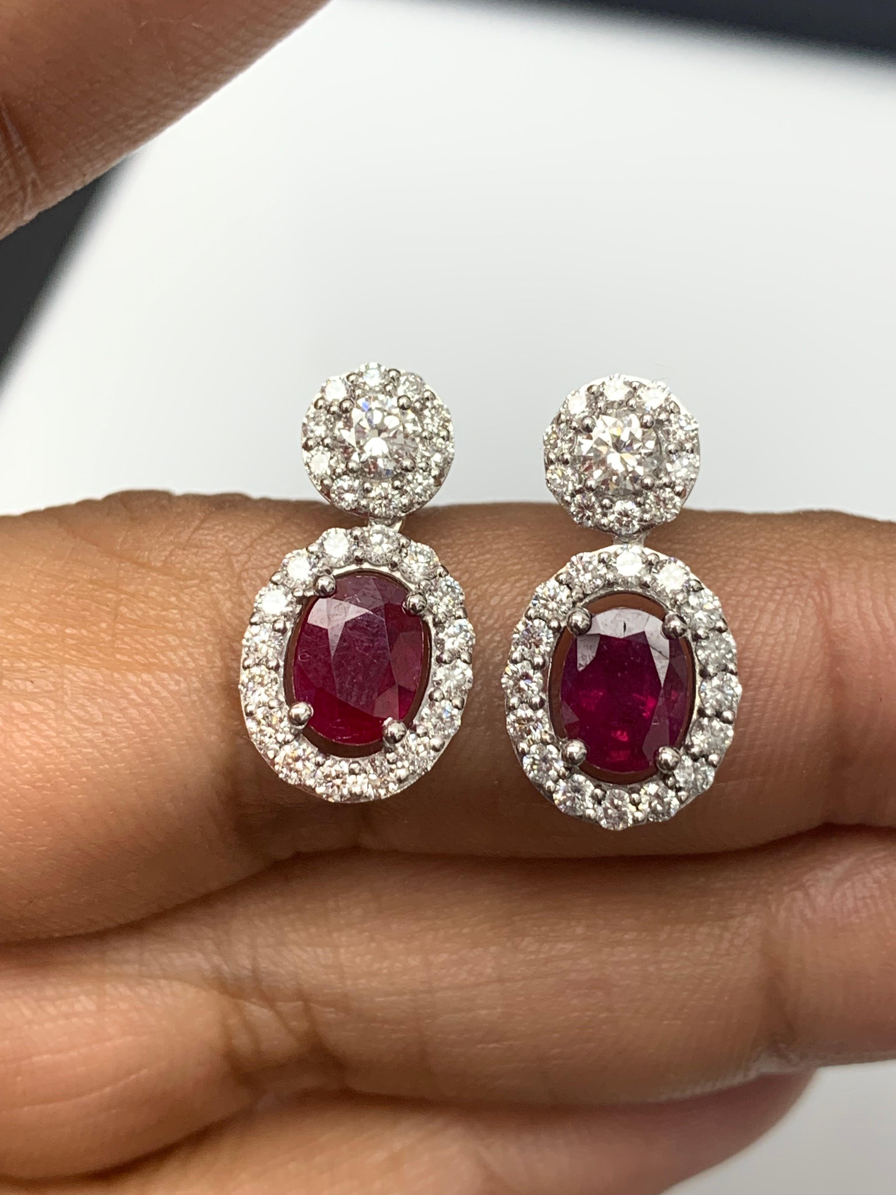 2.32 Carat of Oval cut Rubies and Diamond Drop Earrings in 18K White Gold For Sale 2