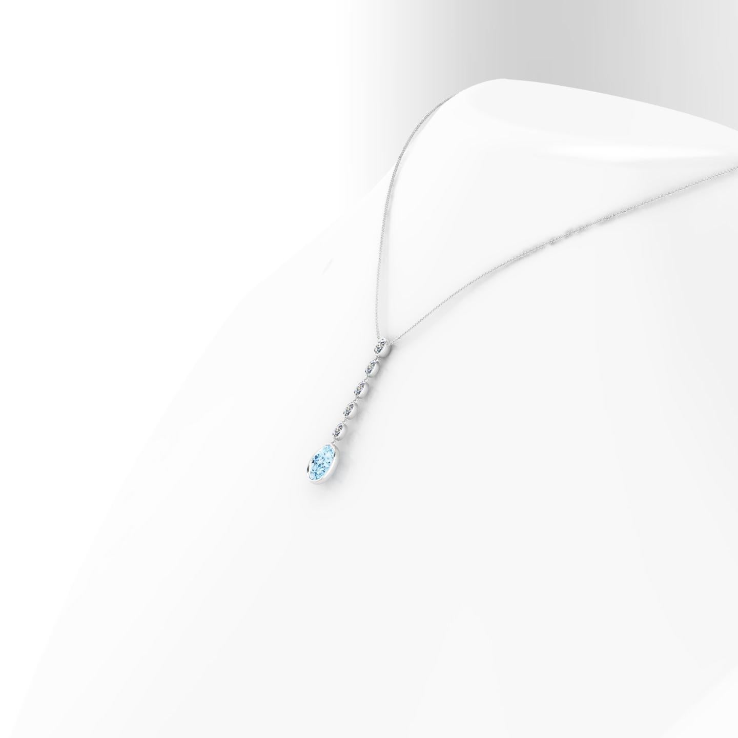 Approximate 2.32 carat Oval, natural Aquamarine, ethically sourced and mined in Brazil, and white, bright Oval cut diamonds for an approximate 0.55 carat weight, set in thin, minimalist bezels in 18k white gold, to enhance the light of the stones