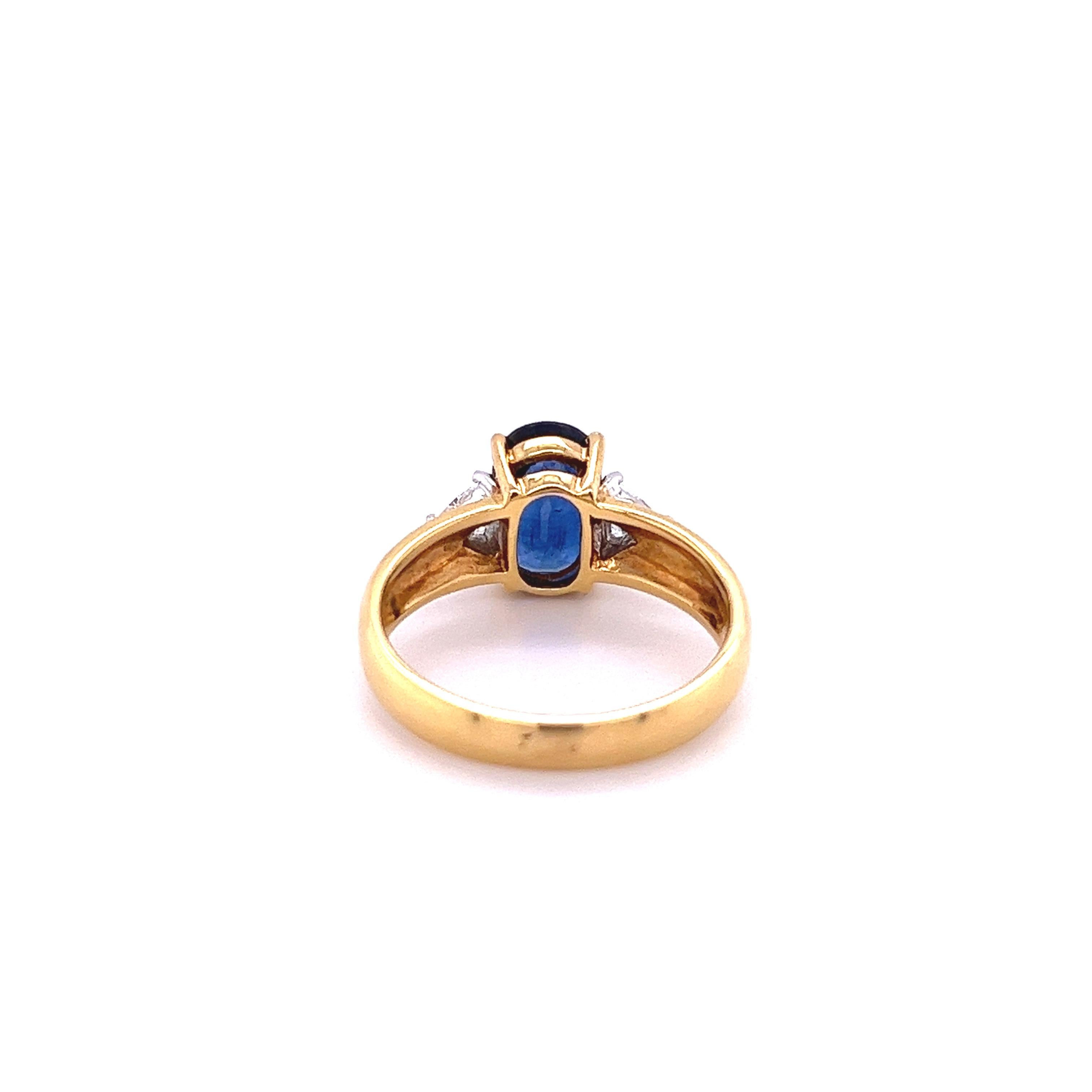 oval diamond with sapphire side stones