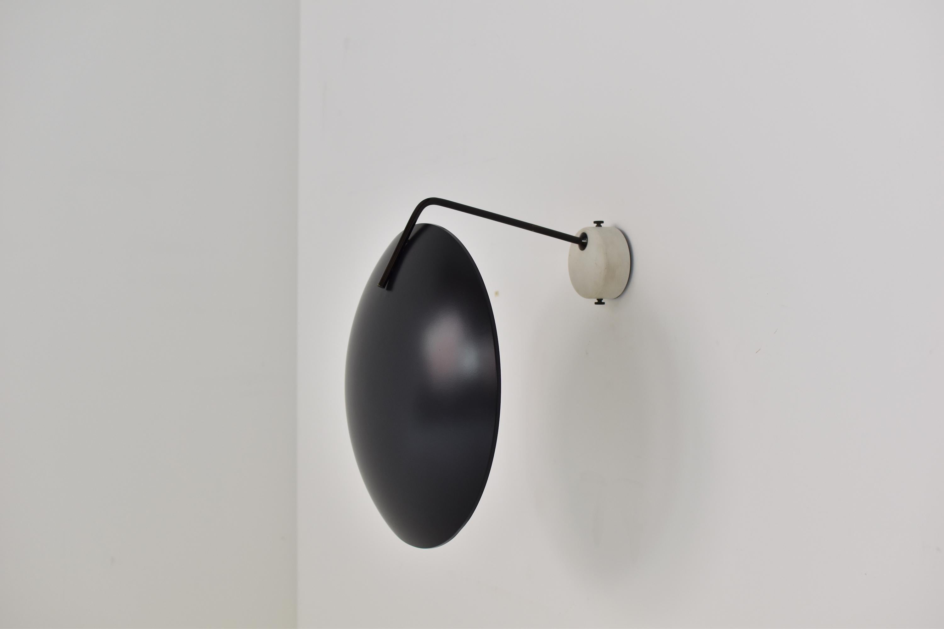 Wall or ceiling pendel by Bruno Gatta for Stillovo, Italy 1954. This is Model No. 232 and features a black lacquered shade hold by a black stem and off white bracket. Professionaly restored. Italian classic.