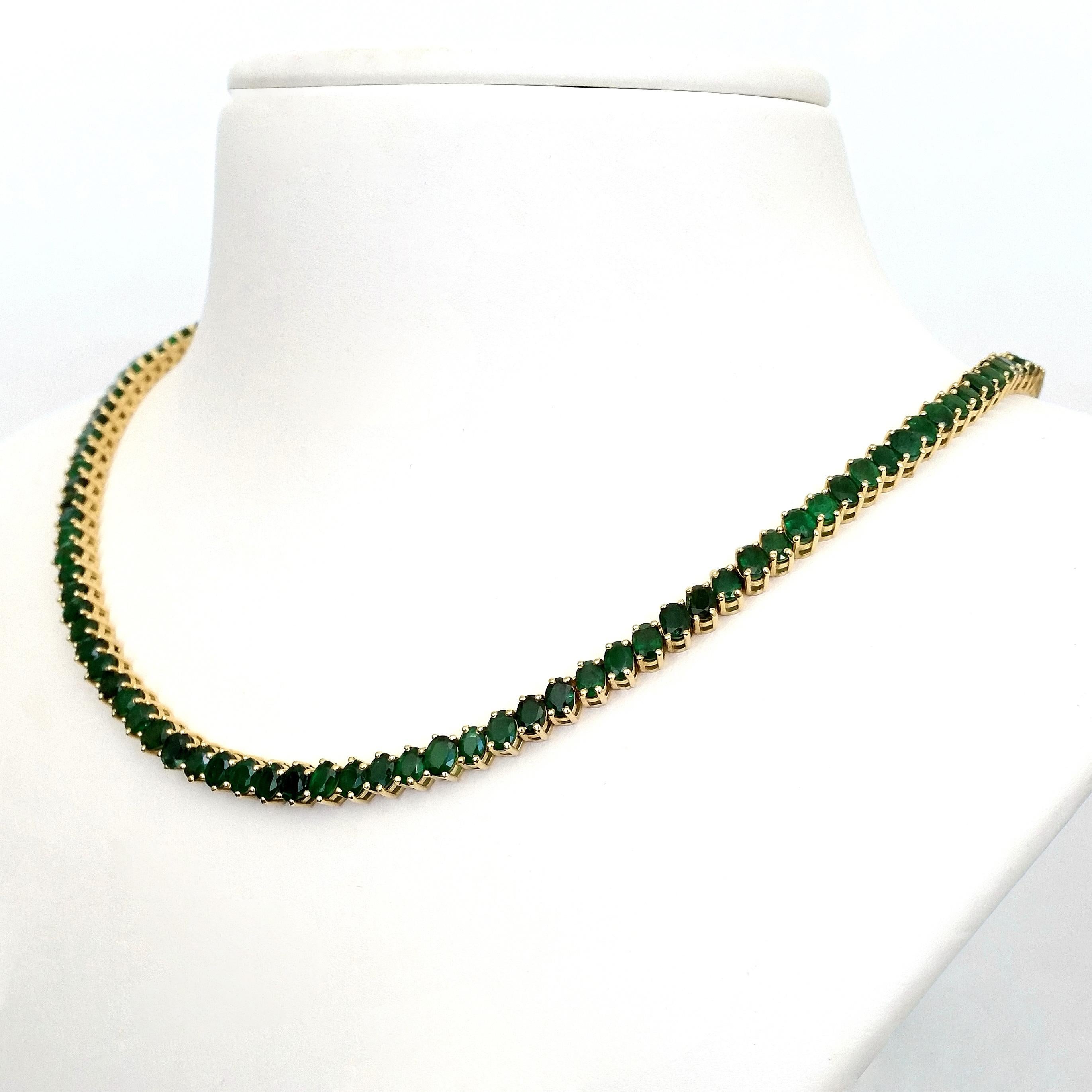 Emerald symbolizes truth and love and this elegant and attractive necklace will make you feel more loved and truthful. This uniquely designed 14kt yellow gold necklace, weighing 30.10 gr, showcases 134 oval mixed cut vivid green emeralds totaling