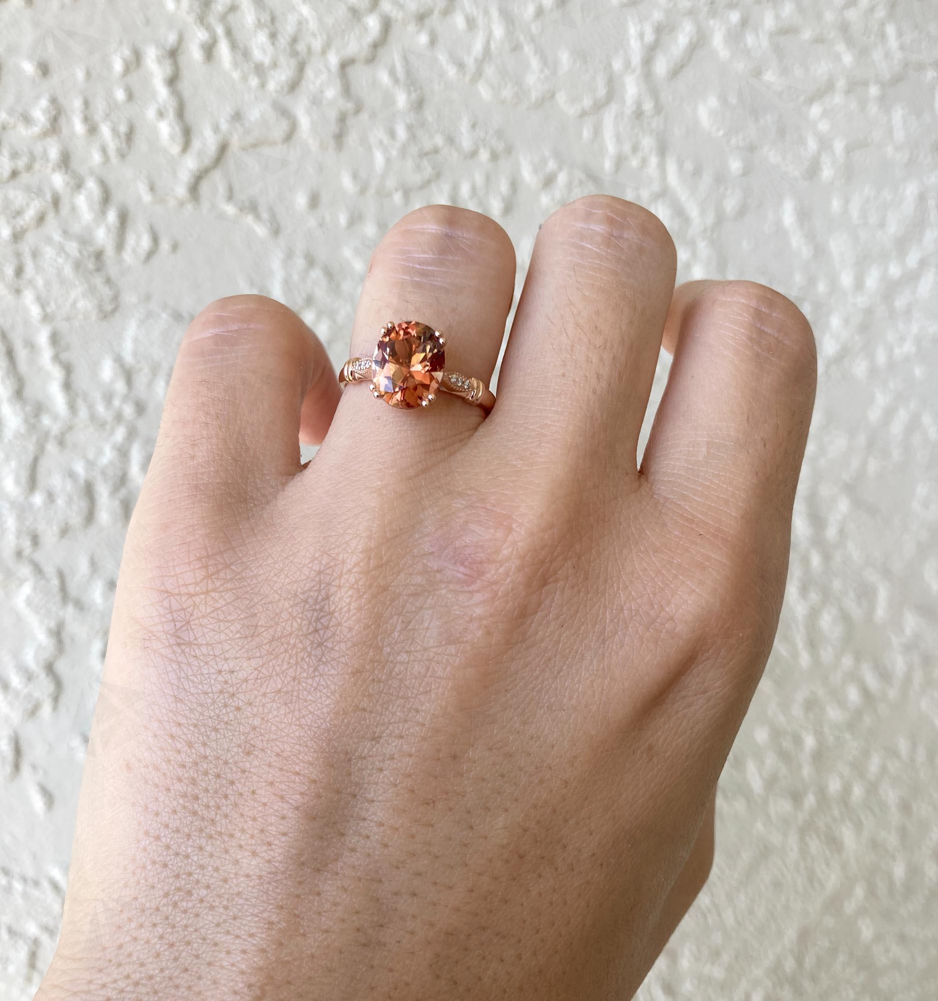 2.32ct Oval Oregon Sunstone with Diamond Sides 14K Rose Gold Engagement Ring In New Condition In Osprey, FL