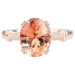2.32ct Oval Oregon Sunstone with Diamond Sides 14K Rose Gold Engagement Ring