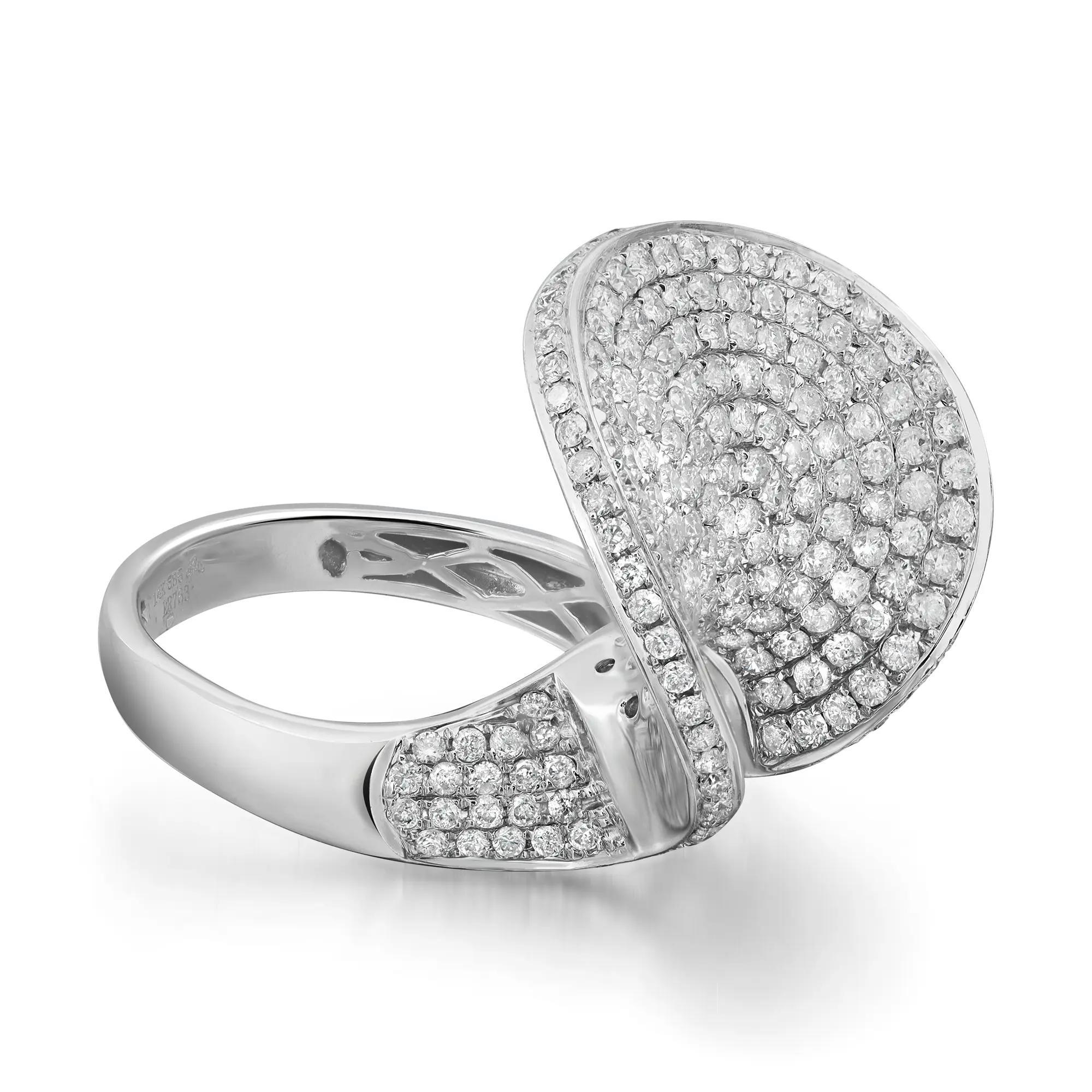 This bold and beautiful cocktail ring features pave set round cut diamonds weighing 2.32 carats. Crafted in 14k white gold, this ring exudes understated style and elegance. Diamond color I and SI1 clarity. Ring size 7.5. Total weight: 9.00 grams. A