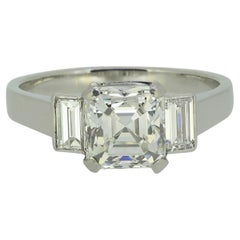 2.33 Carat Asscher Cut Diamond and Baguette Cut Diamond Three-Stone Ring