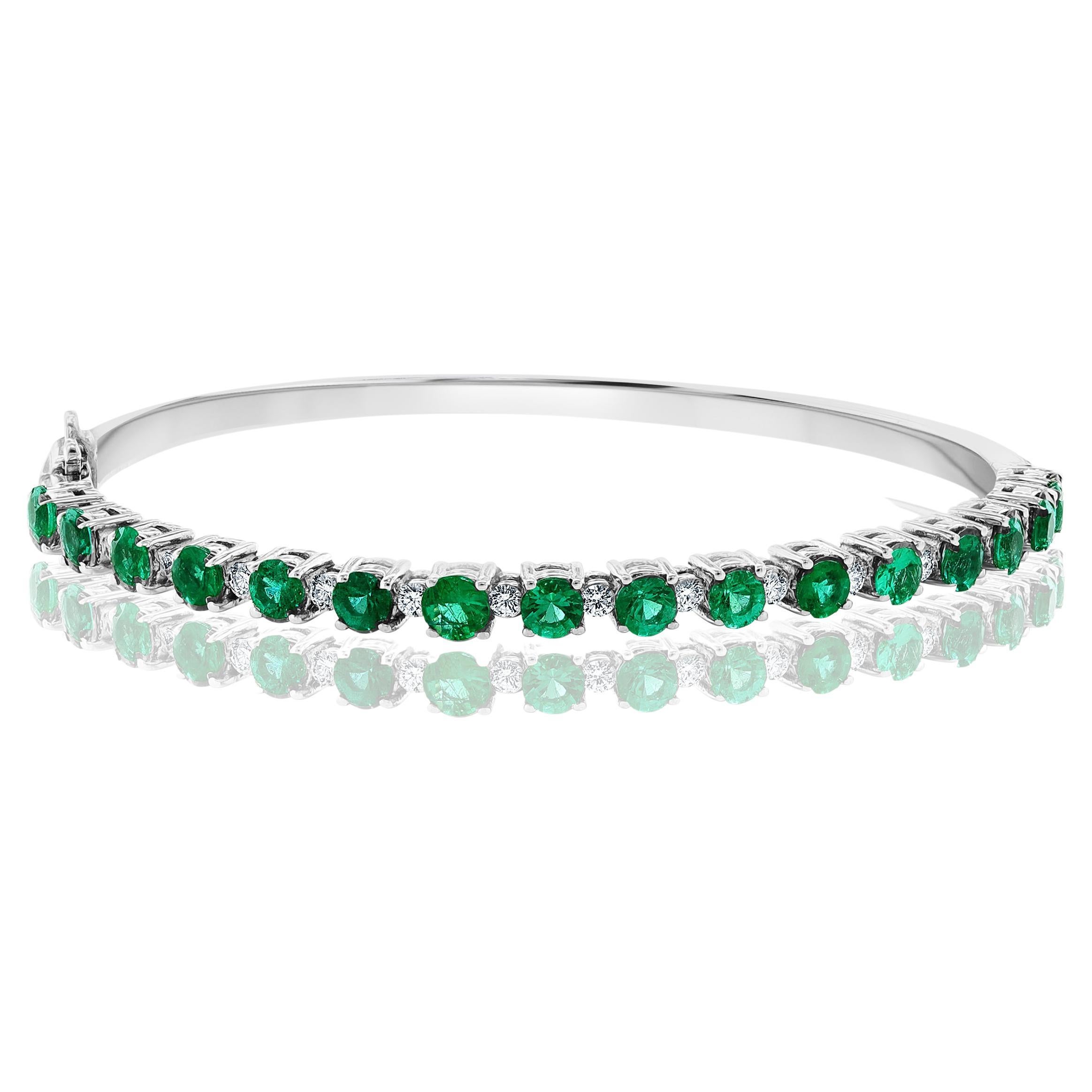 2.33 Carat Emerald and Diamond Bangle Bracelet in 14 K White Gold For Sale